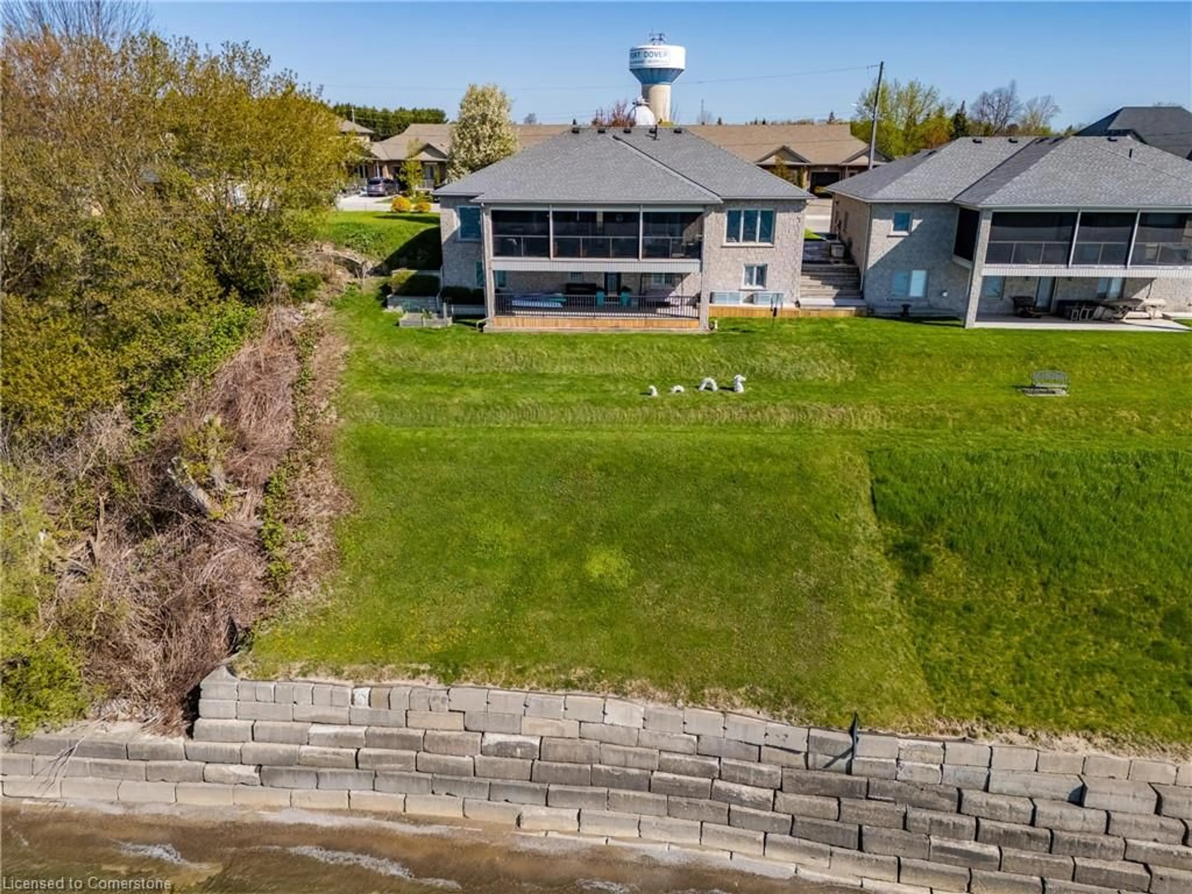A pic from outside/outdoor area/front of a property/back of a property/a pic from drone, water/lake/river/ocean view for 140 Brown St, Port Dover Ontario N0A 1N7
