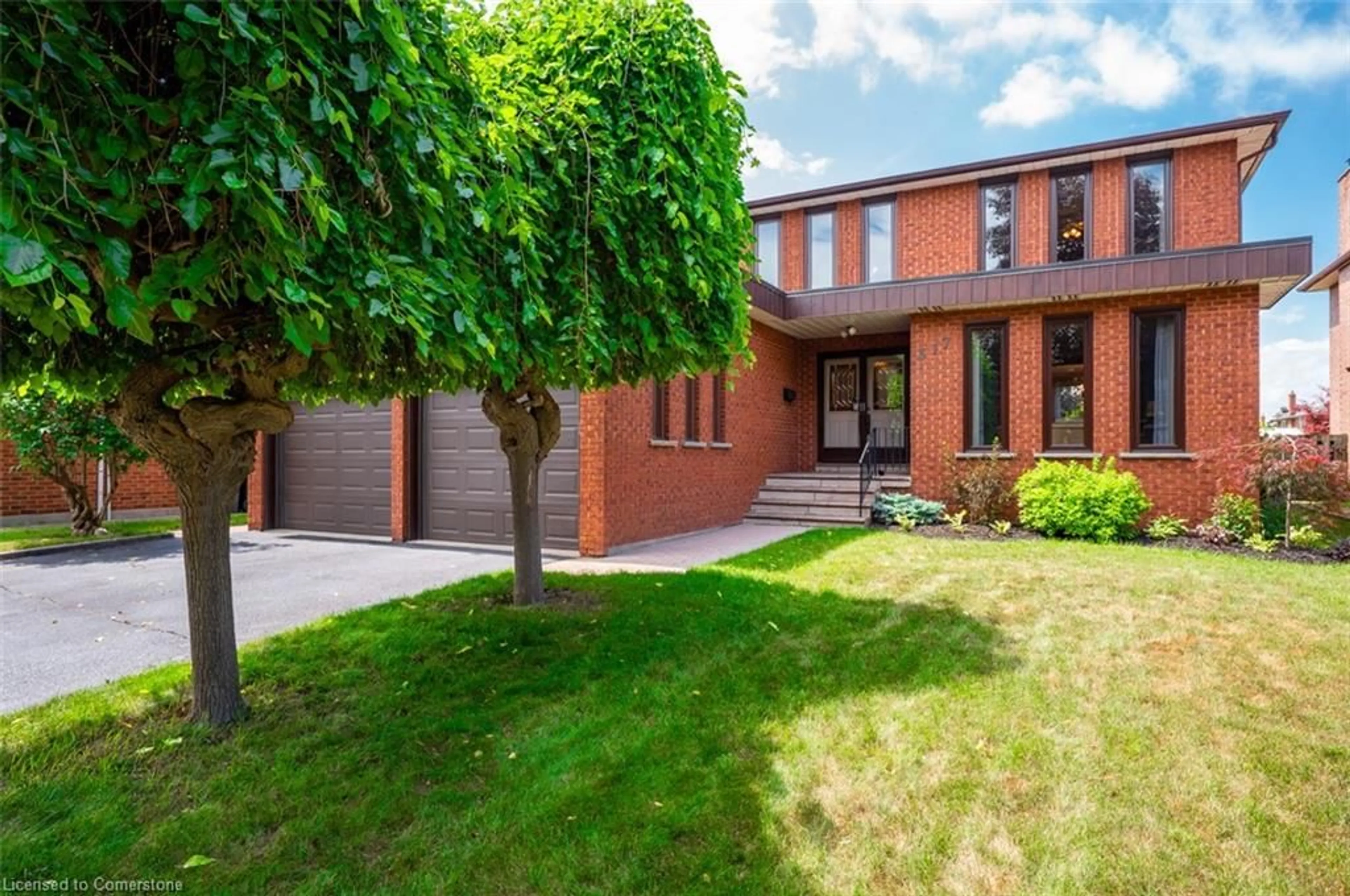 Home with brick exterior material, street for 317 Creelman Rd, Mississauga Ontario L5A 4A6