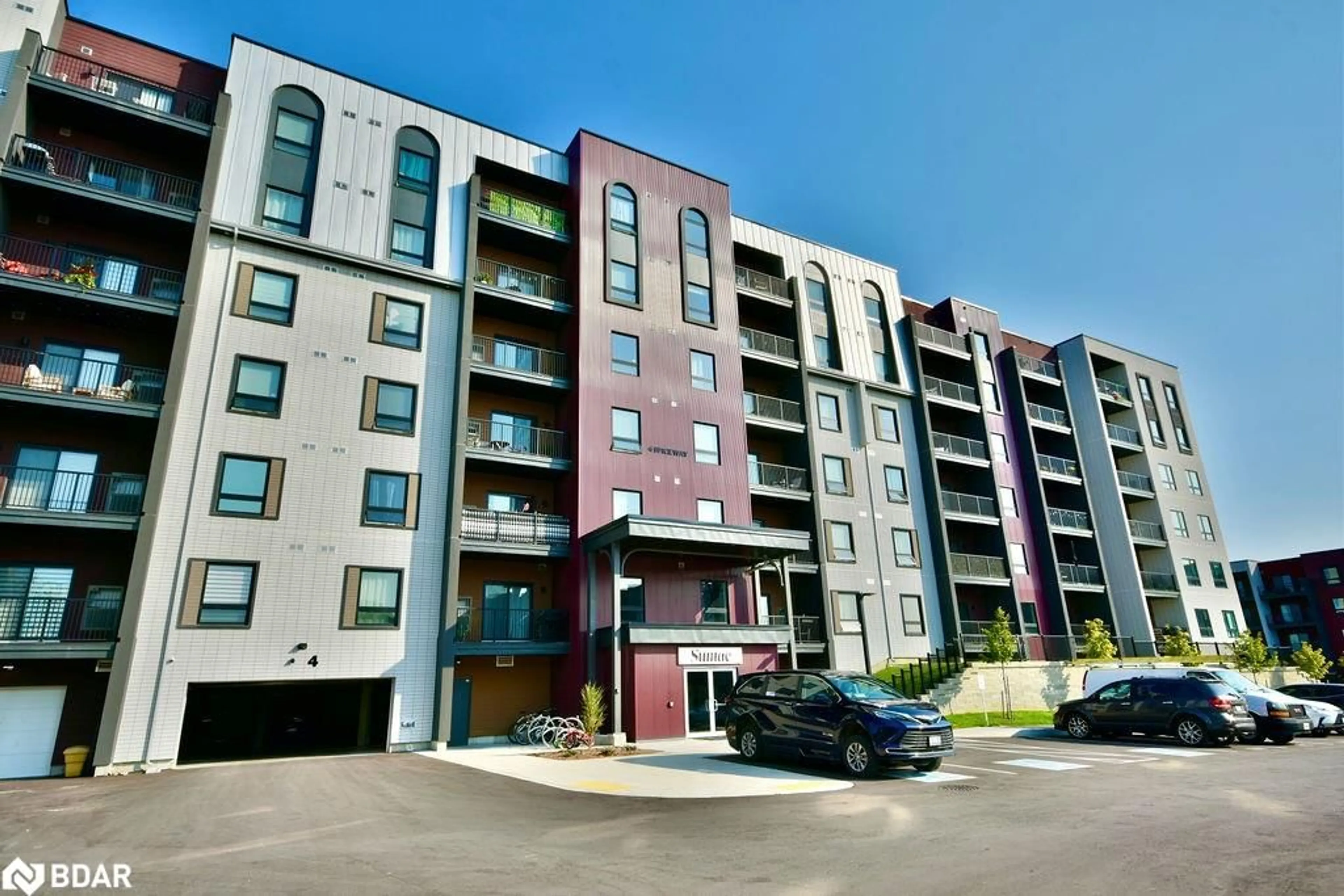 A pic from outside/outdoor area/front of a property/back of a property/a pic from drone, street for 4 Spice Way Way #515, Barrie Ontario L9J 0M2