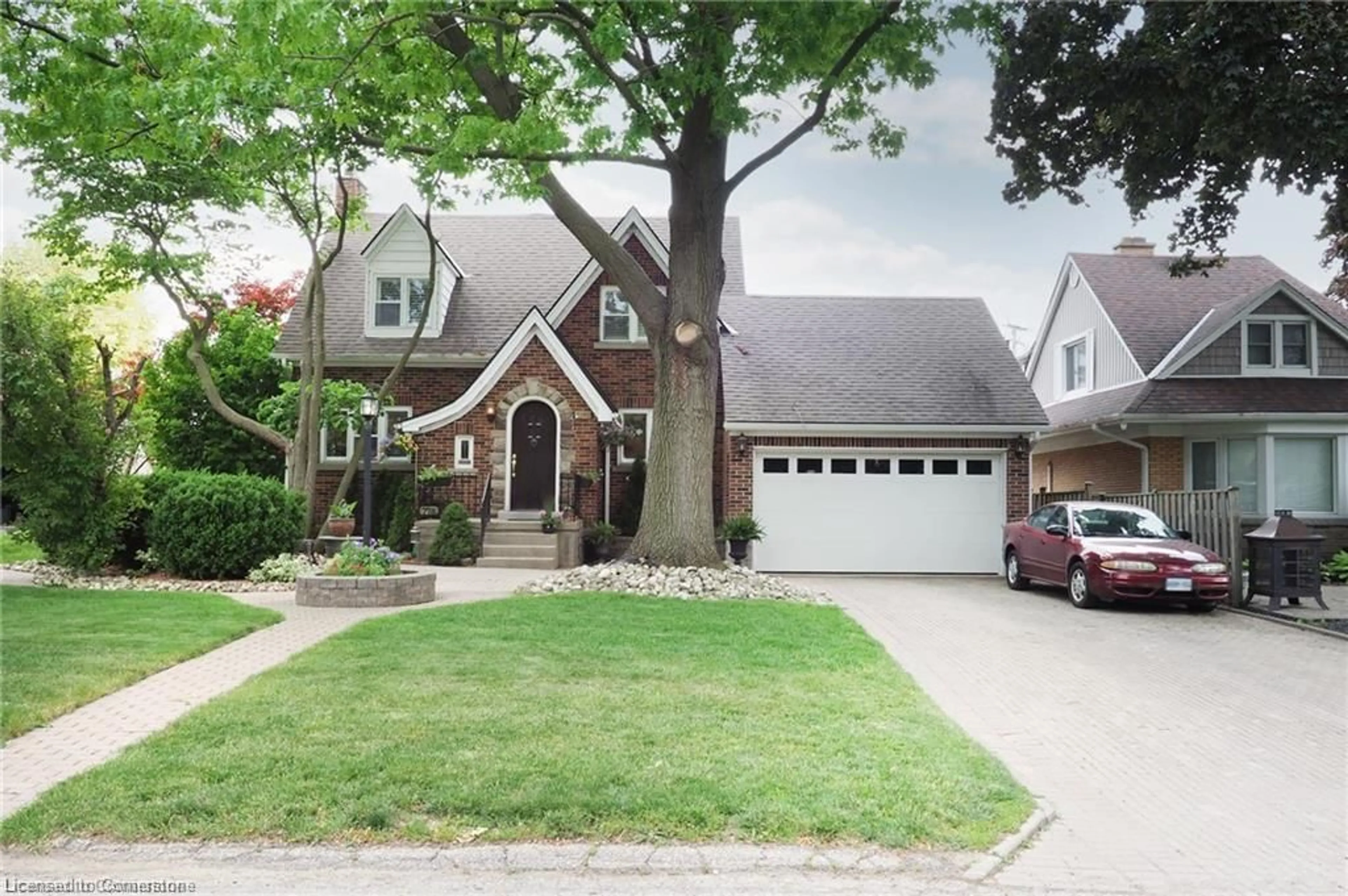 Home with brick exterior material, street for 718 Rockway Dr, Kitchener Ontario N2G 3B4