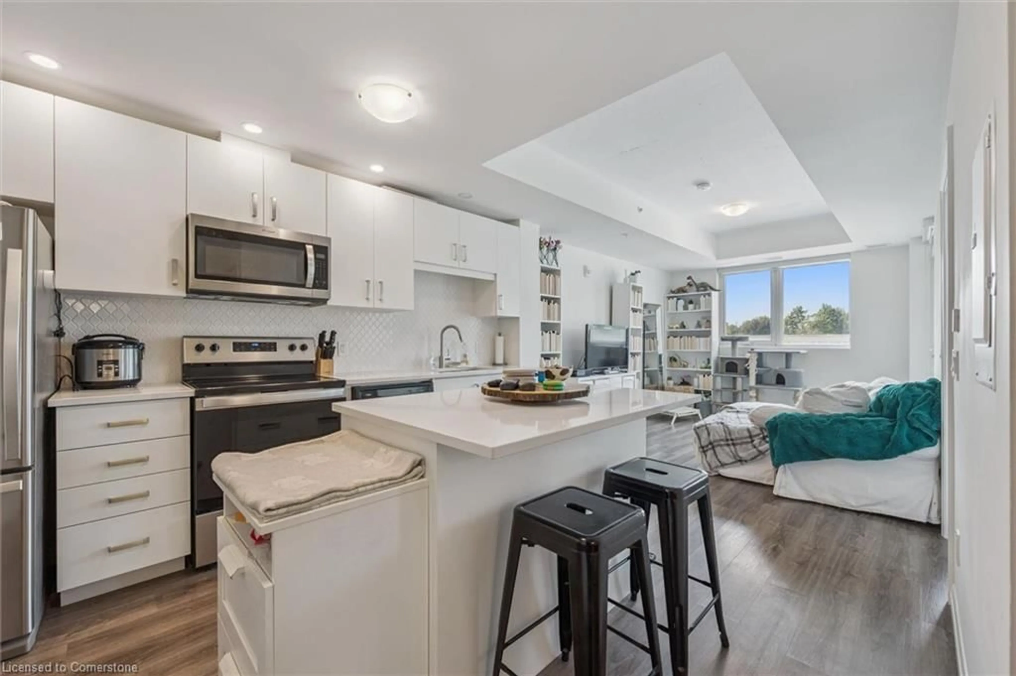 Open concept kitchen, ceramic/tile floor for 108 Garment St #213, Kitchener Ontario N2G 0E2