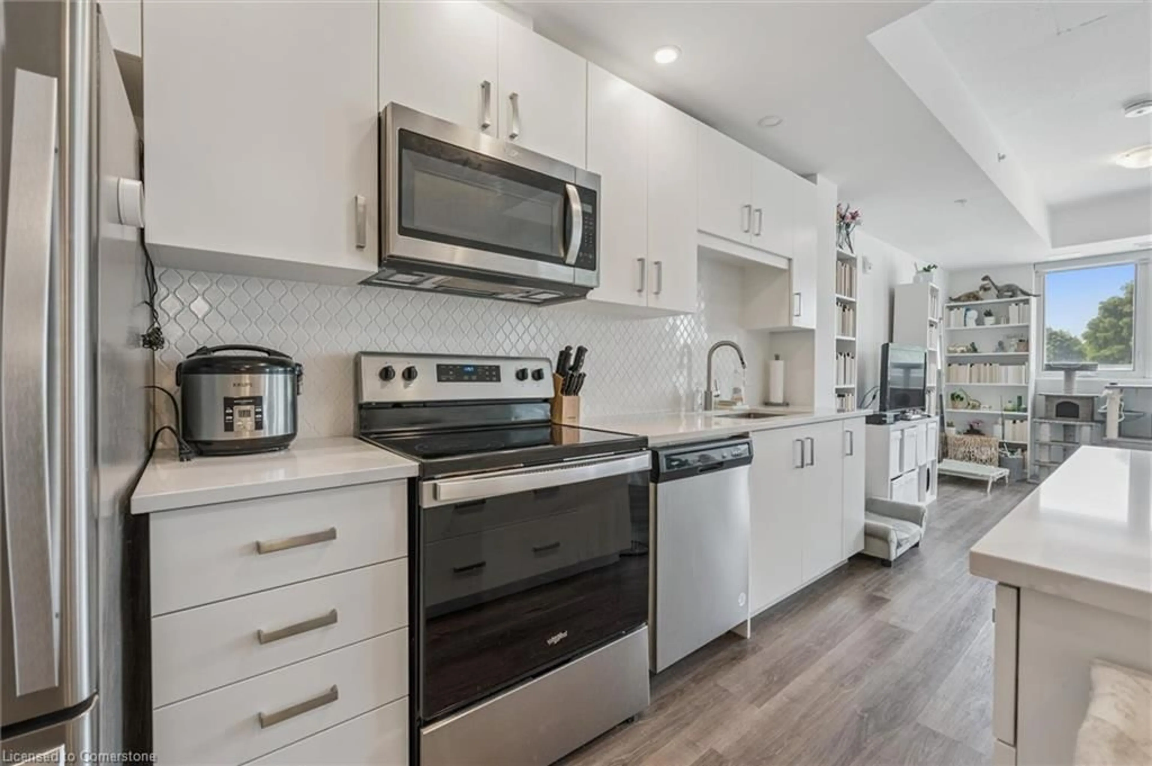 Open concept kitchen, ceramic/tile floor for 108 Garment St #213, Kitchener Ontario N2G 0E2