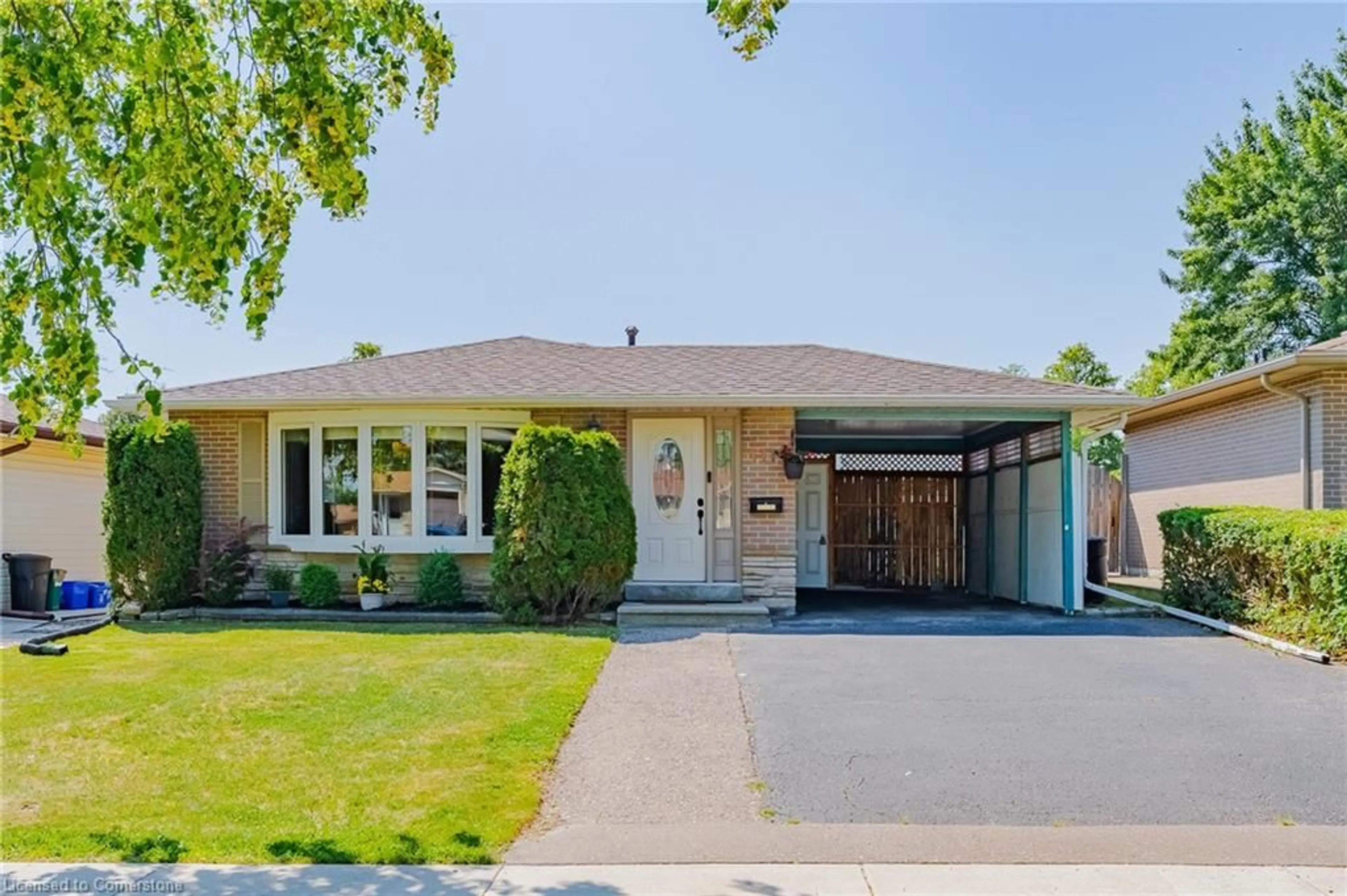 Home with brick exterior material, street for 211 Hazelglen Dr, Kitchener Ontario N2M 2E6