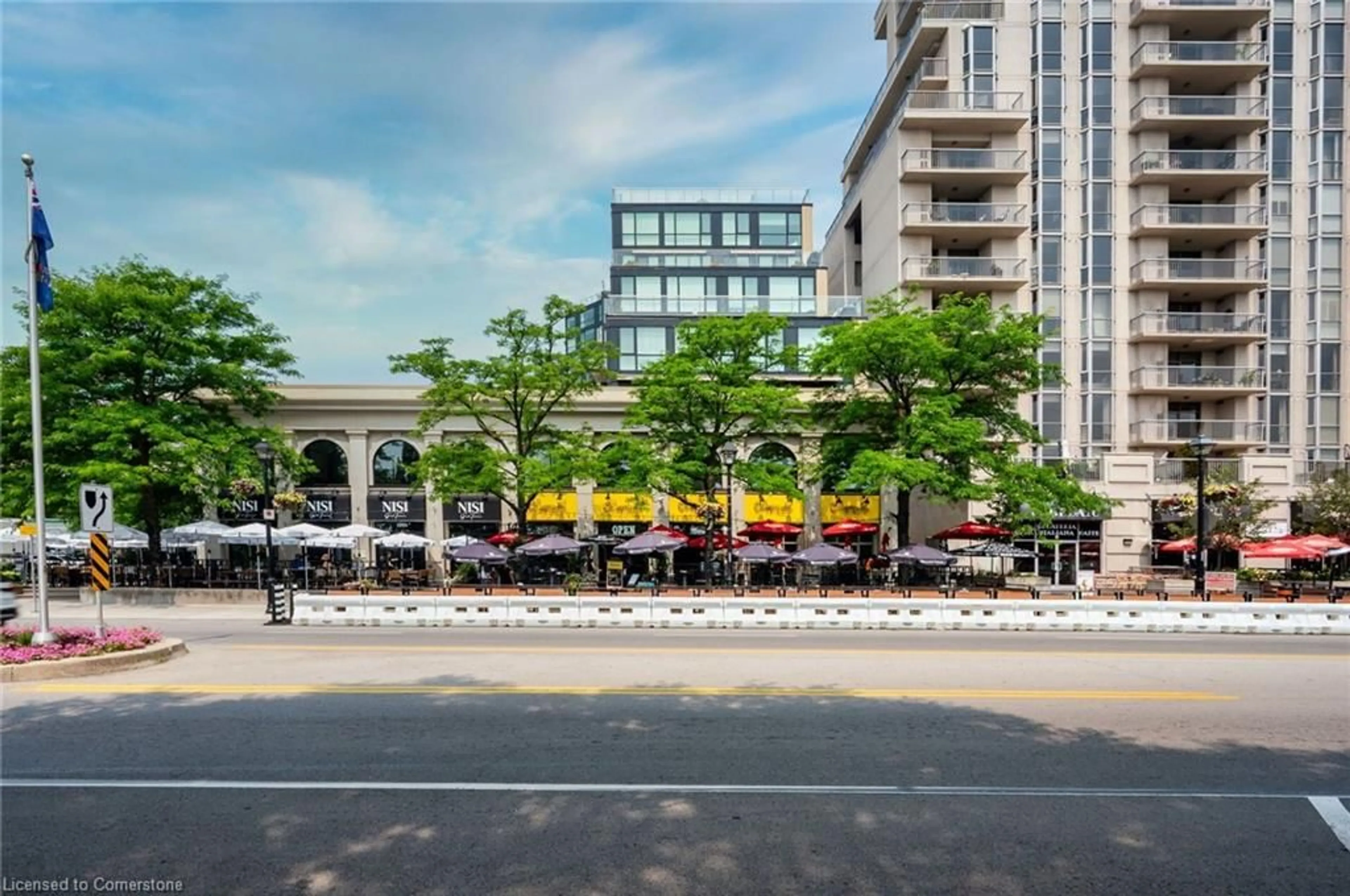 Patio, city buildings view from balcony for 415 Locust St #406, Burlington Ontario L7S 2J2