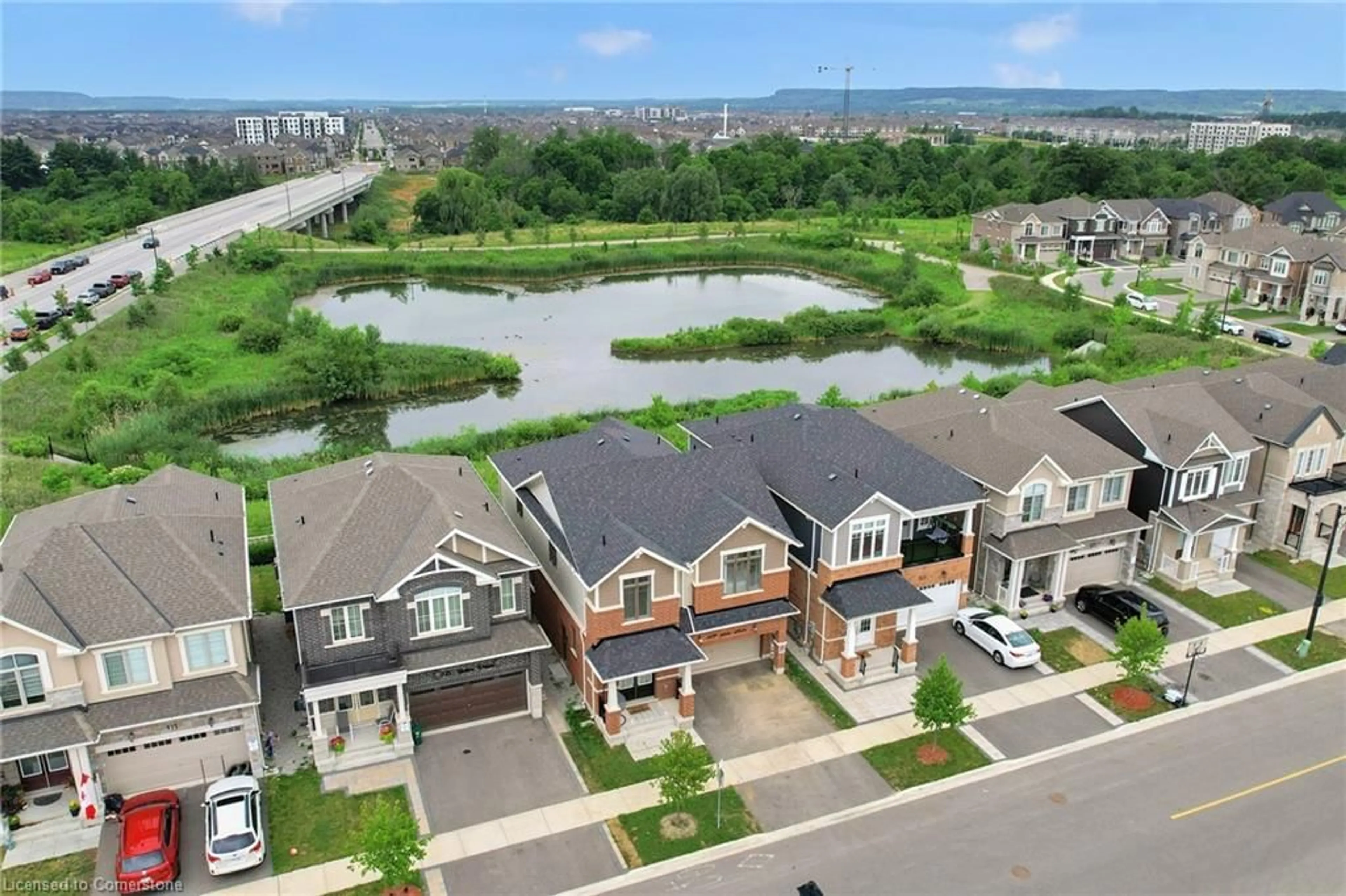 A pic from outside/outdoor area/front of a property/back of a property/a pic from drone, water/lake/river/ocean view for 119 Yates Dr, Milton Ontario L9E 1S5