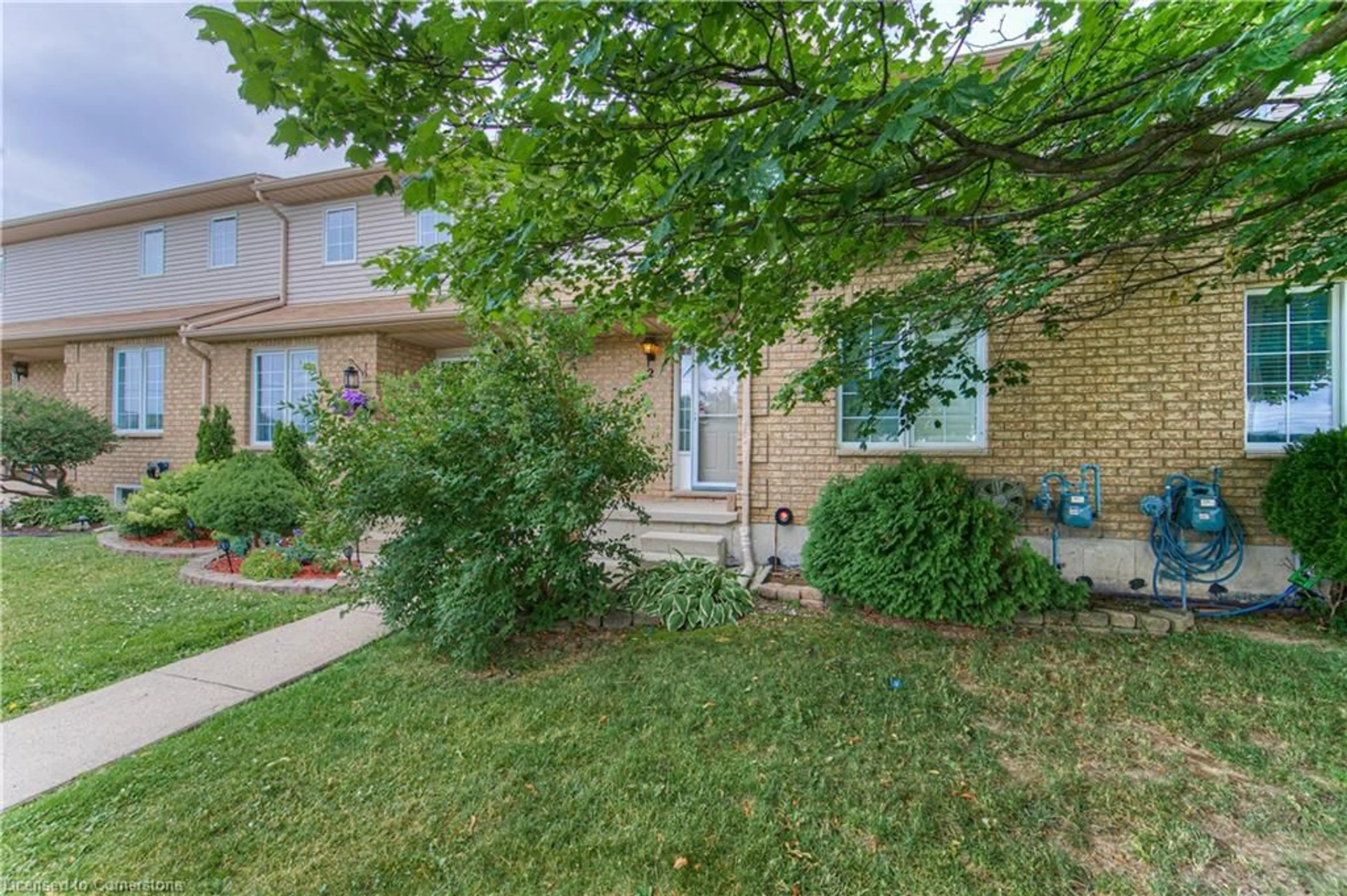 Home with brick exterior material, street for 12 Whitedeer Rd #2, Stoney Creek Ontario L8J 3T4
