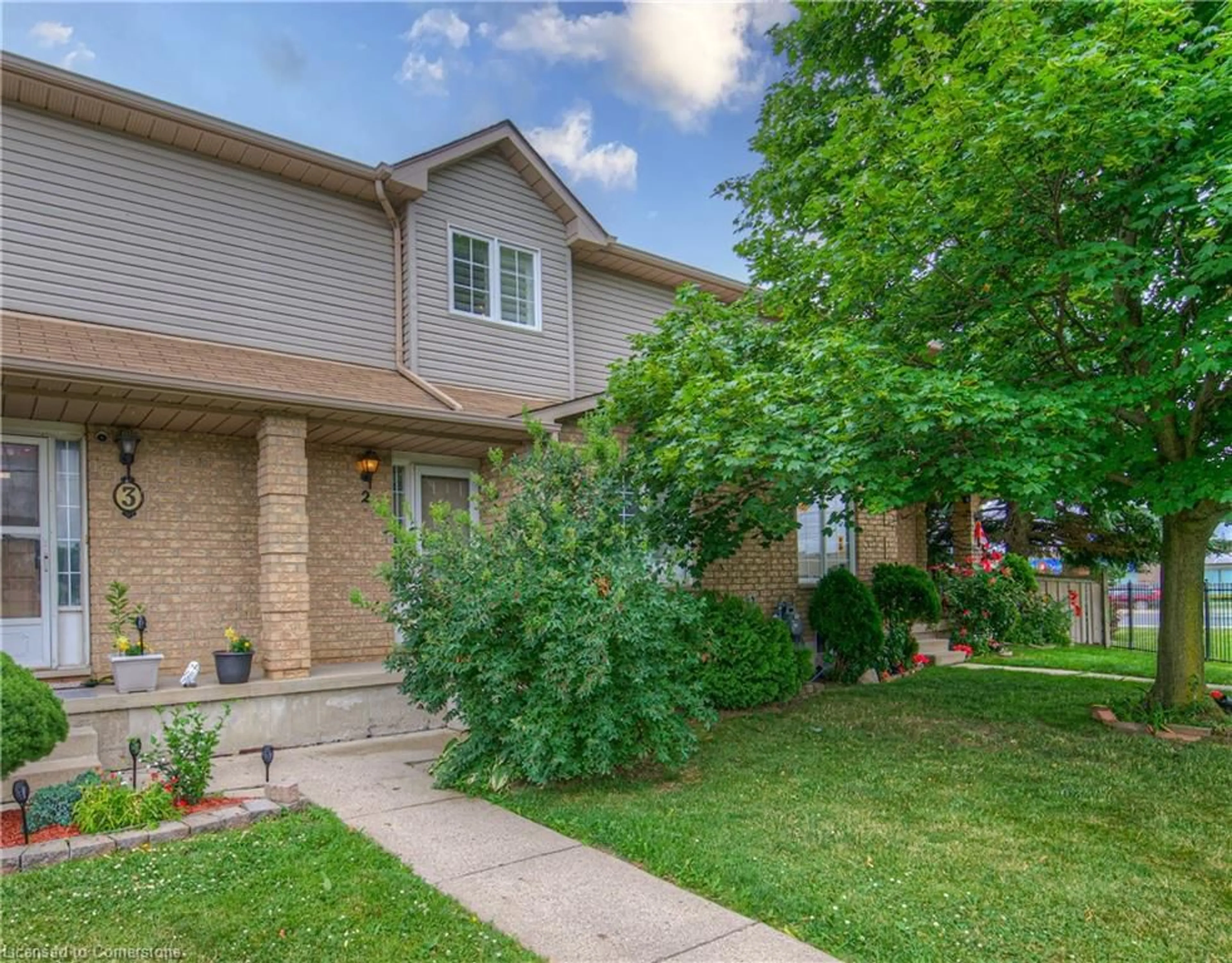 Home with brick exterior material, street for 12 Whitedeer Rd #2, Stoney Creek Ontario L8J 3T4