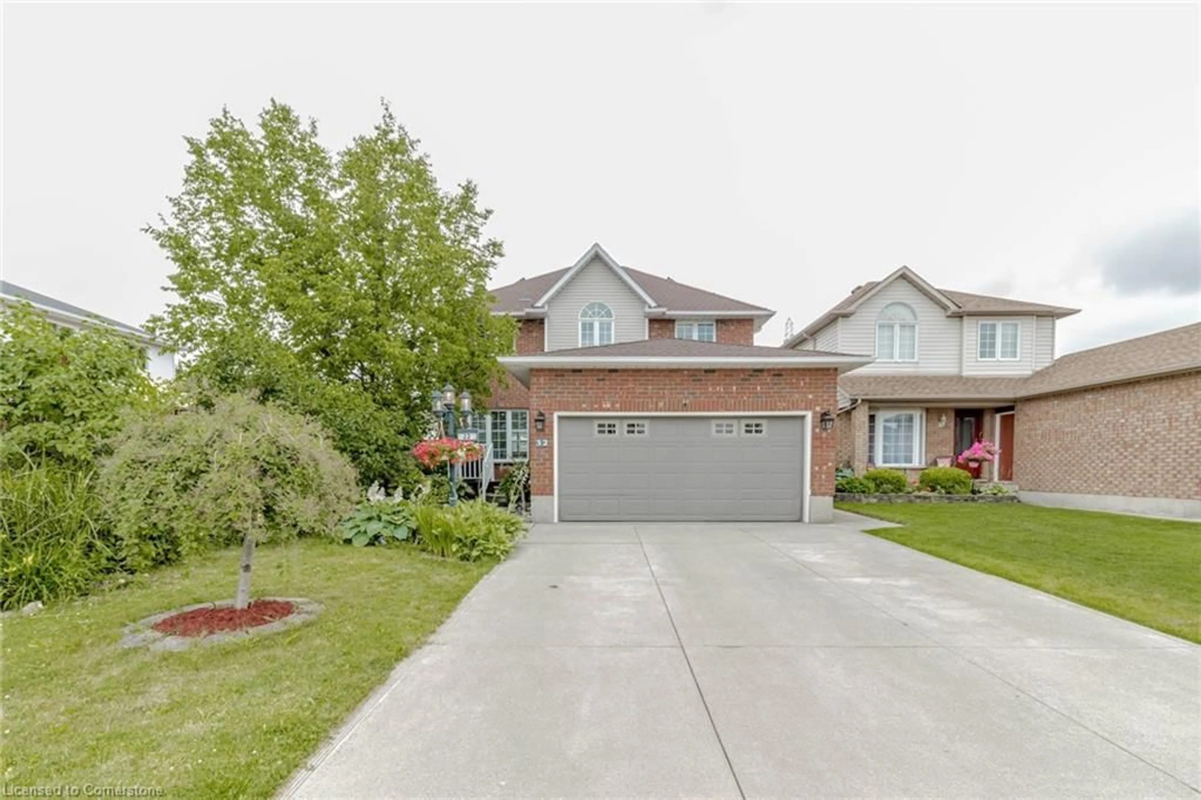 Home with brick exterior material, street for 32 Vineberg Dr, Hamilton Ontario L9B 2P6