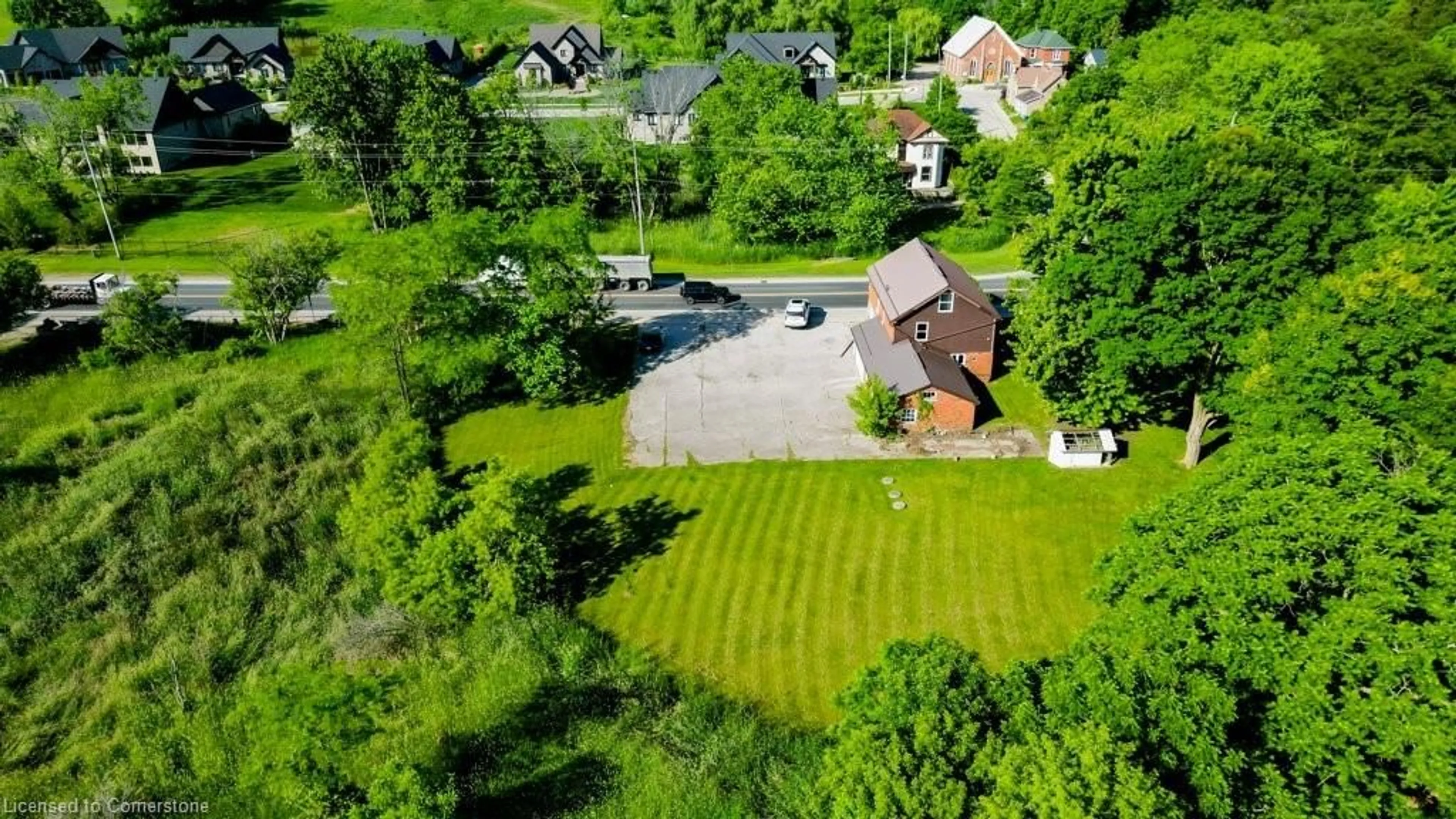 A pic from outside/outdoor area/front of a property/back of a property/a pic from drone, street for 59 Queen St, Morriston Ontario N0B 2C0