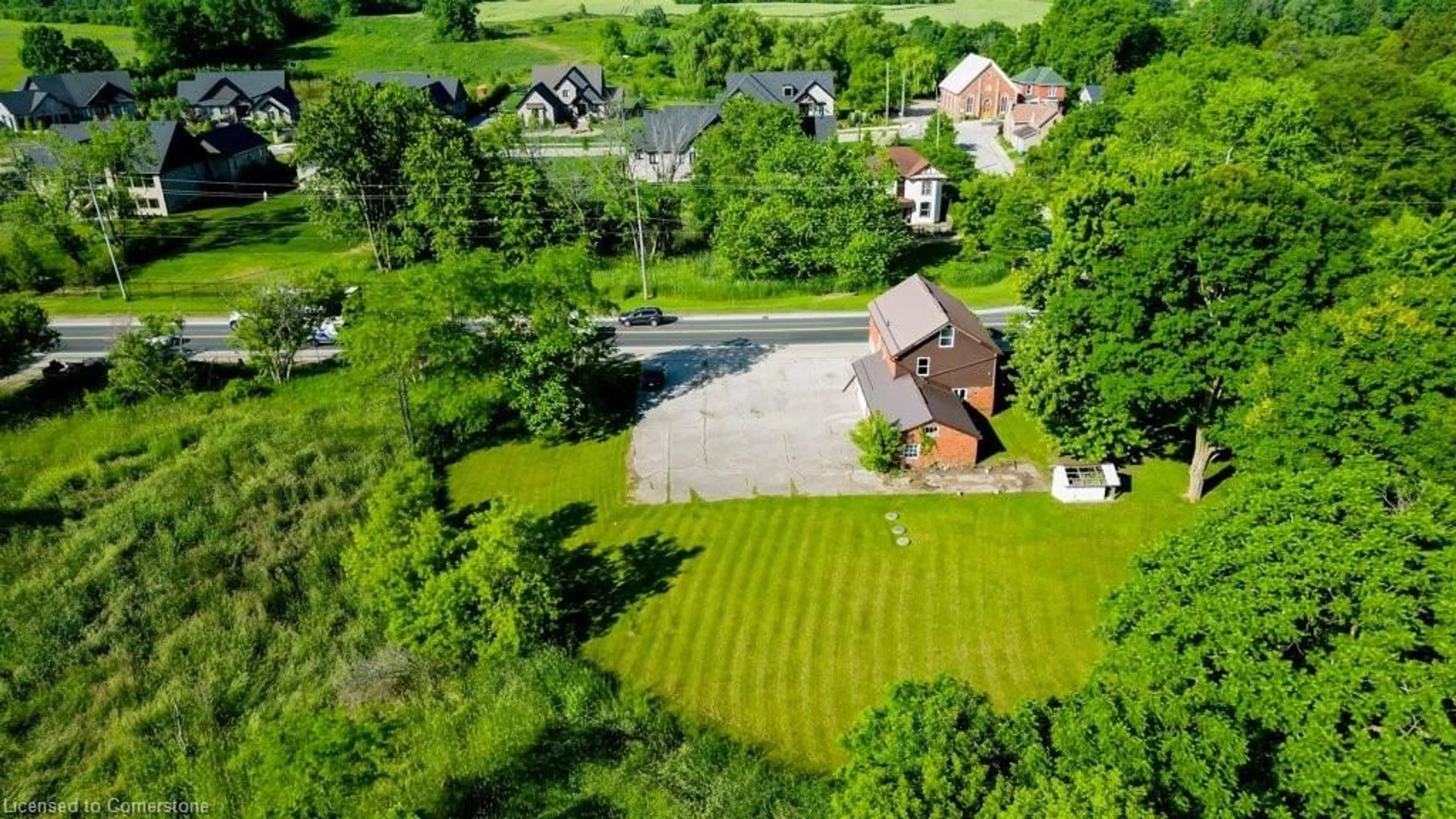 A pic from outside/outdoor area/front of a property/back of a property/a pic from drone, street for 59 Queen St, Morriston Ontario N0B 2C0