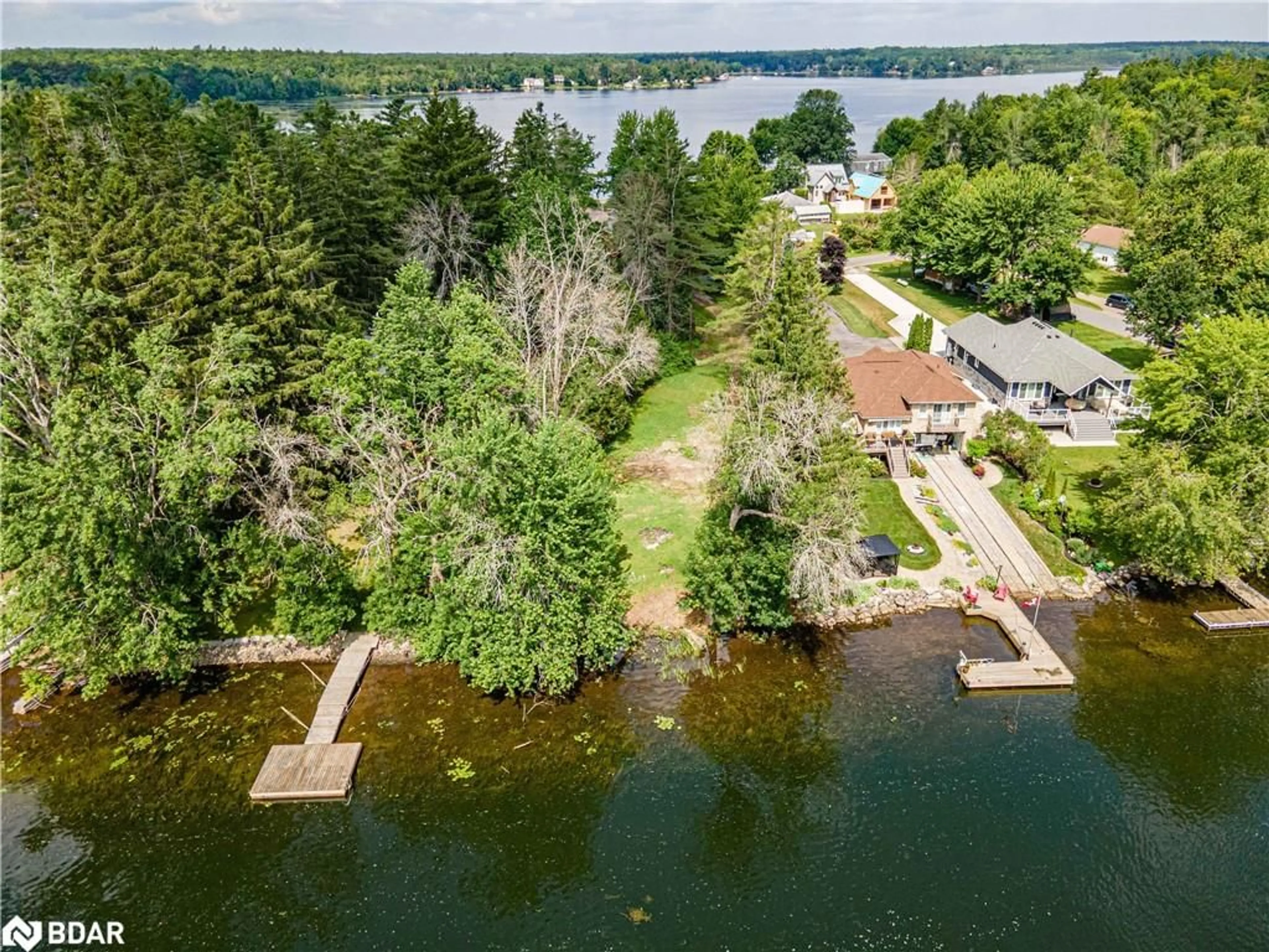 A pic from outside/outdoor area/front of a property/back of a property/a pic from drone, water/lake/river/ocean view for 1705 Peninsula Pt Road, Severn Ontario P0E 1N0