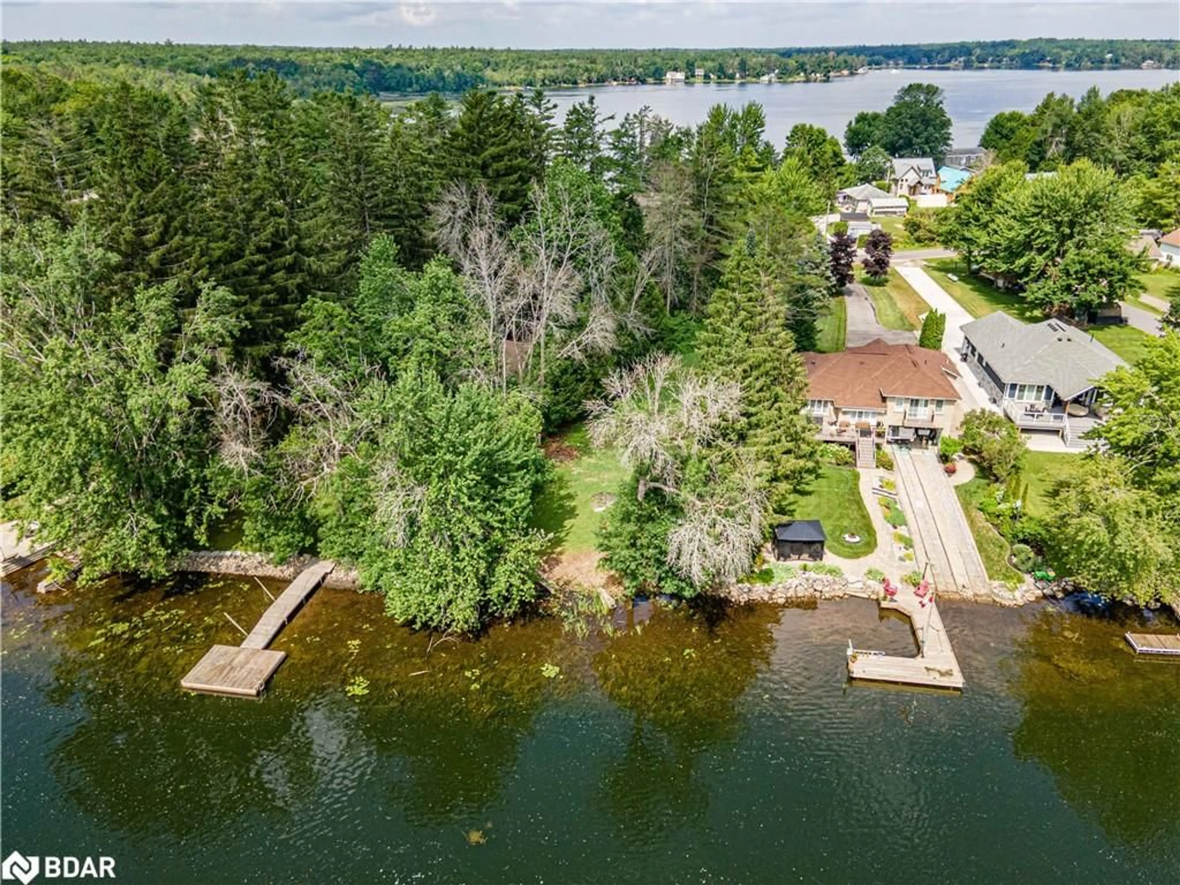 A pic from outside/outdoor area/front of a property/back of a property/a pic from drone, water/lake/river/ocean view for 1705 Peninsula Pt Road, Severn Ontario P0E 1N0