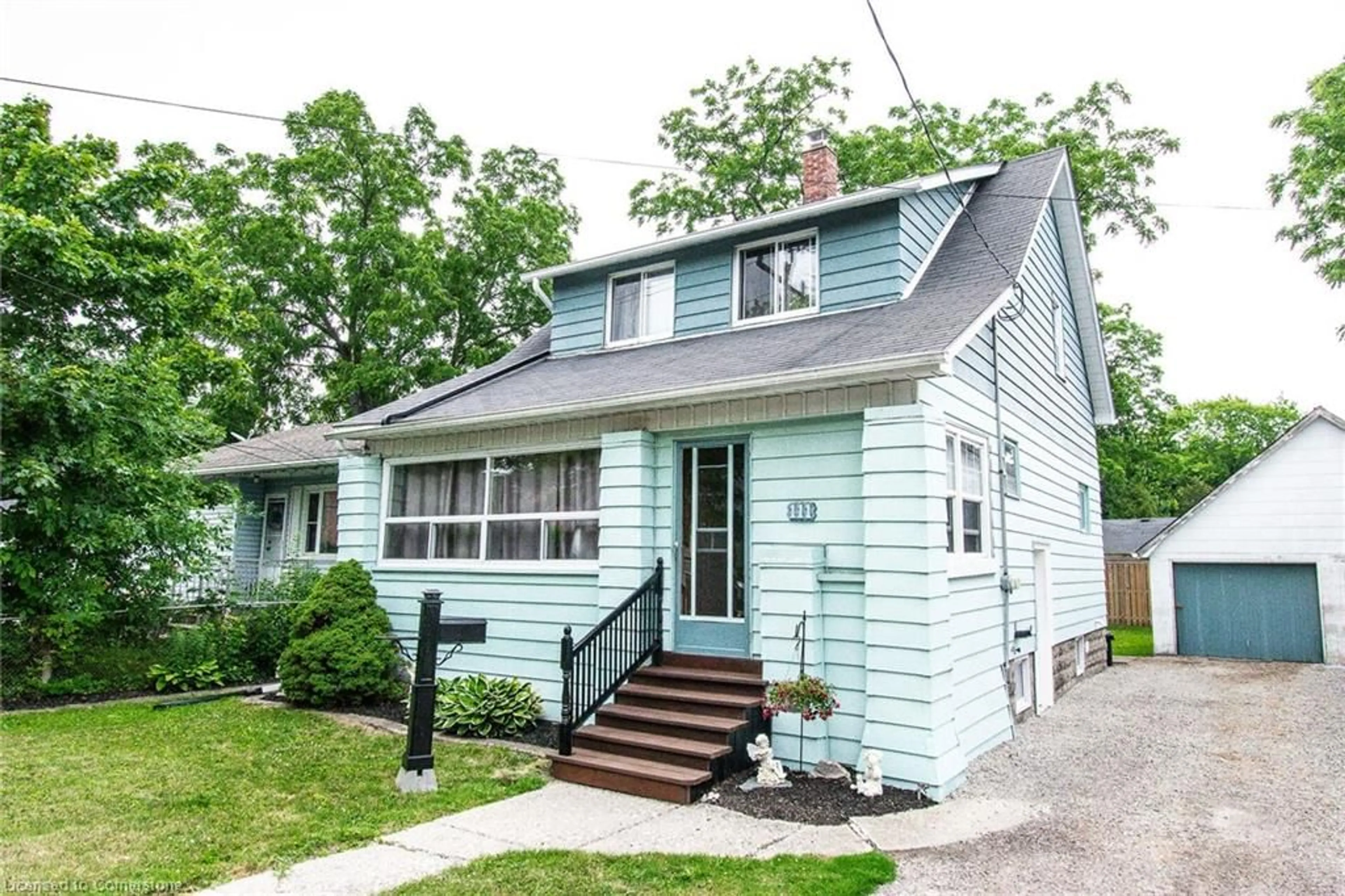 Home with vinyl exterior material, street for 111 John St, Dunnville Ontario N1A 2P6