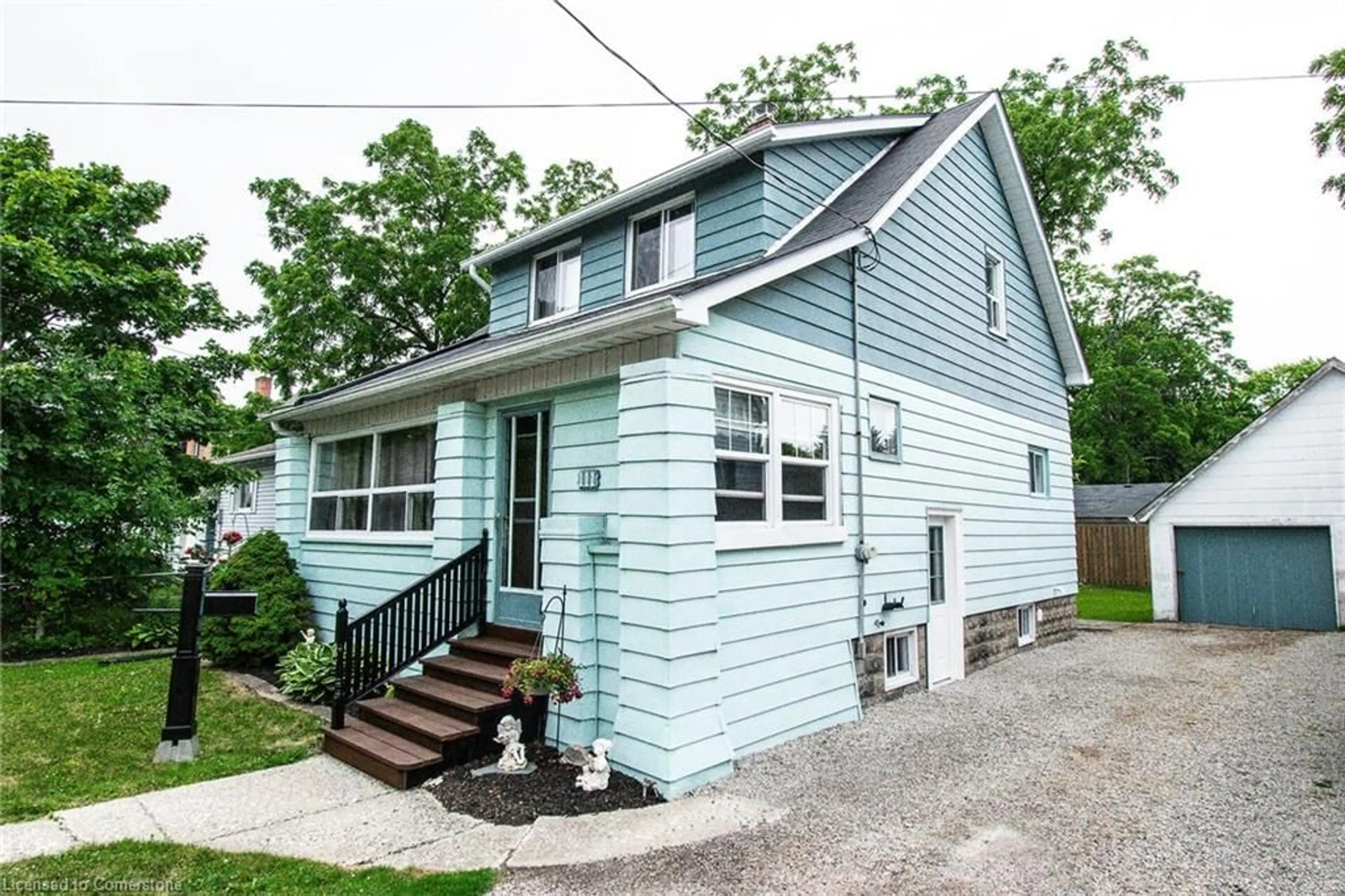 Home with vinyl exterior material, street for 111 John St, Dunnville Ontario N1A 2P6