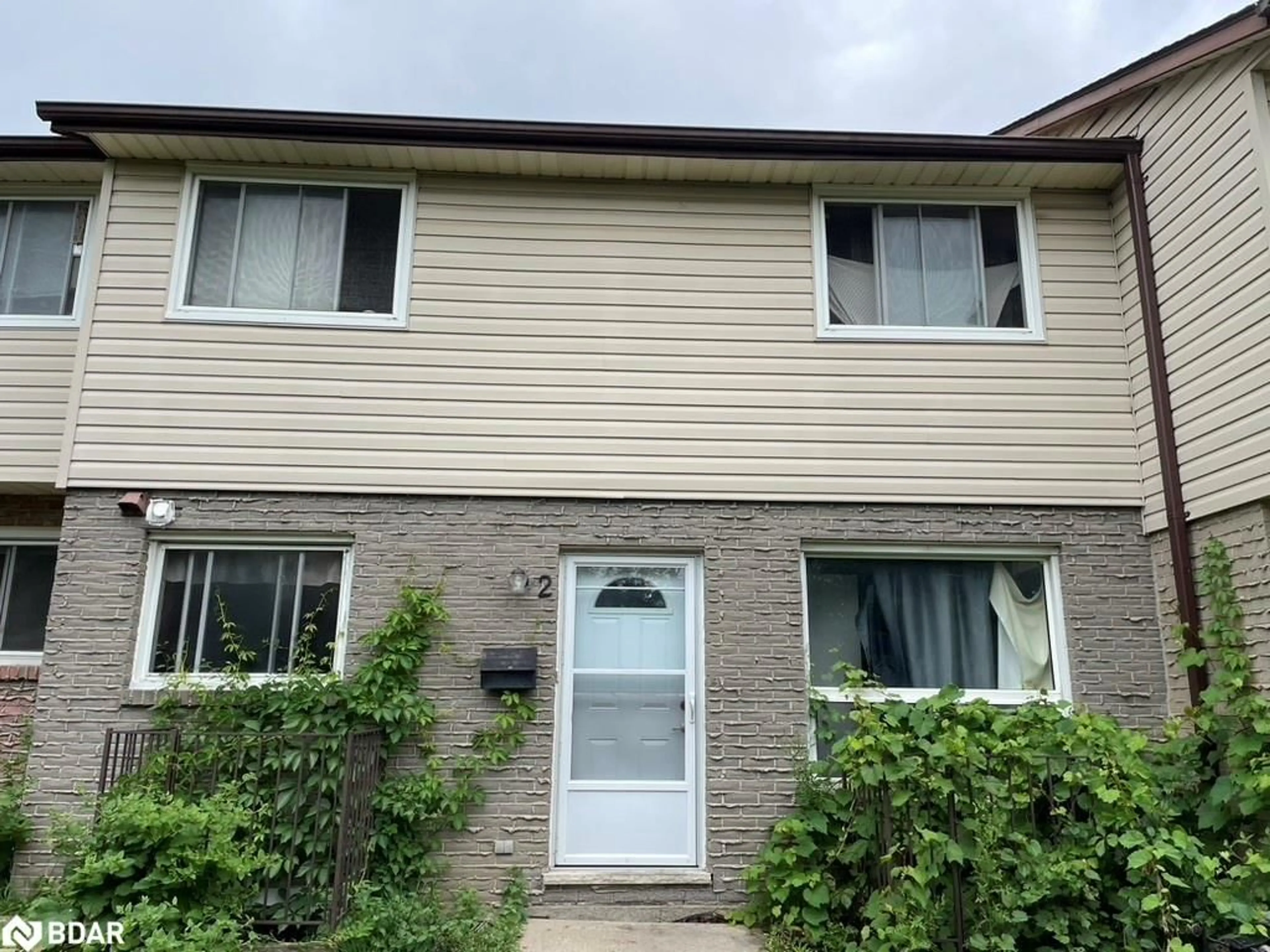 Home with vinyl exterior material, street for 455 Albert St #2, Waterloo Ontario N2L 5A7