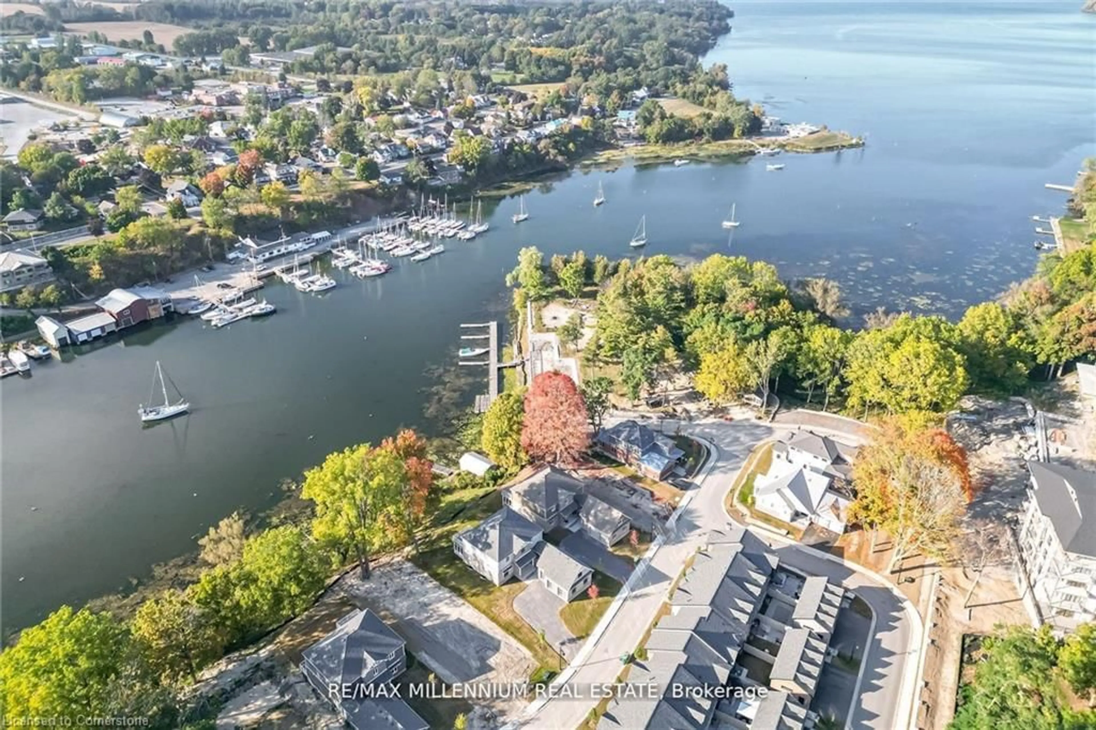 A pic from outside/outdoor area/front of a property/back of a property/a pic from drone, water/lake/river/ocean view for 115 Villeneuve Drive Dr, Picton Ontario K0K 2T0