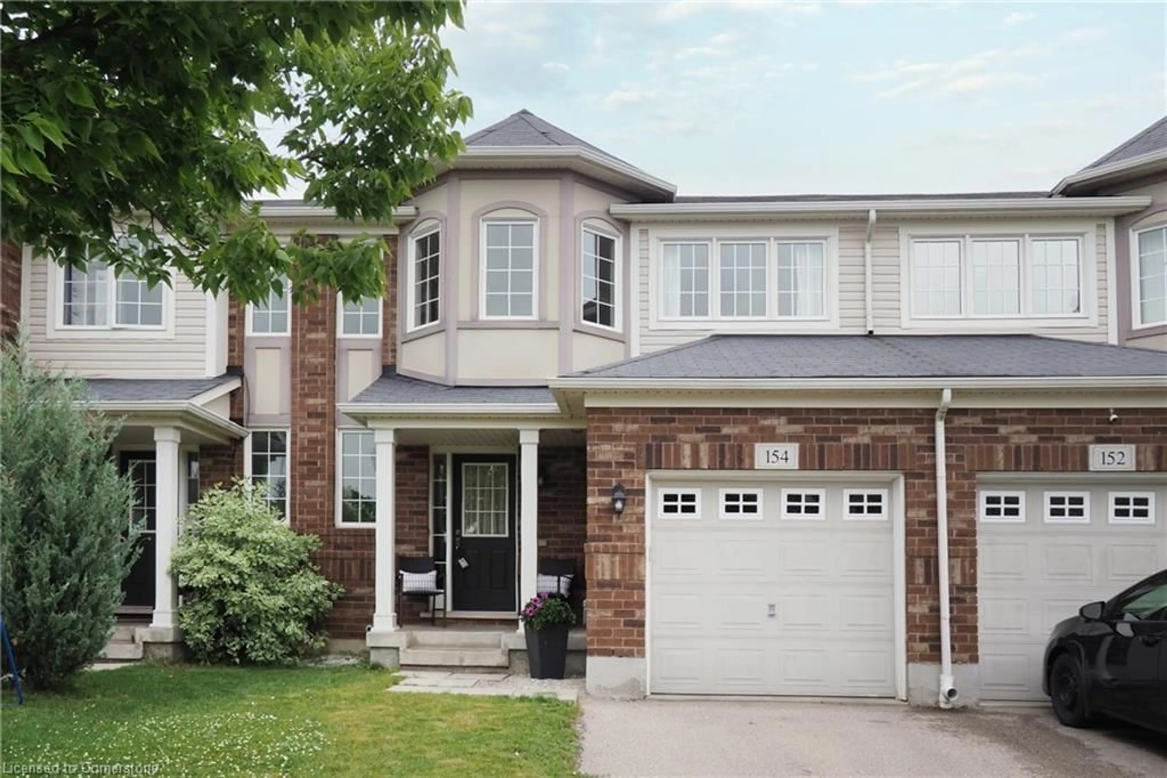 Home with brick exterior material, street for 154 Silverthorne Dr, Cambridge Ontario N3C 0C3