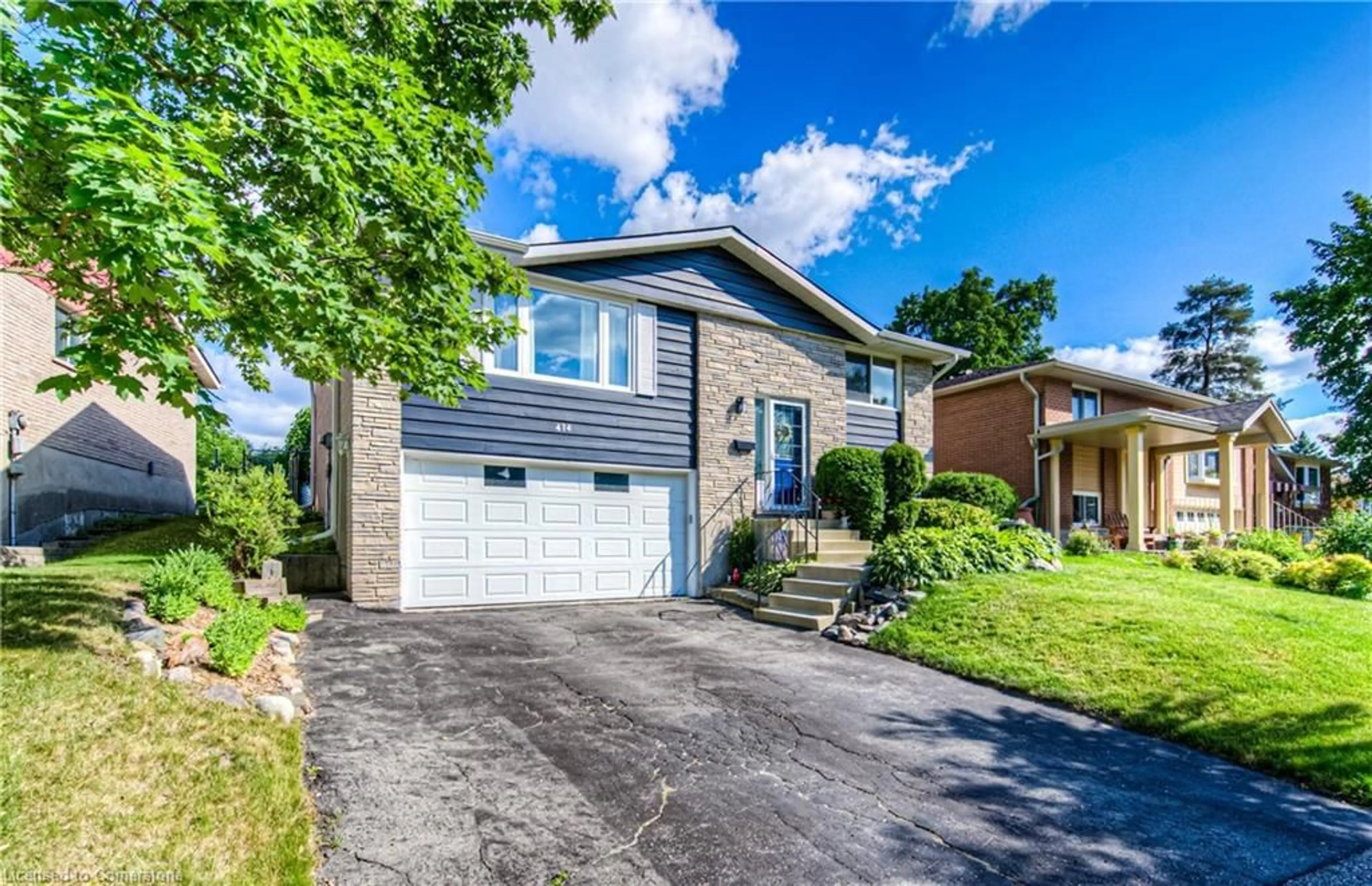 Home with brick exterior material, street for 414 Lakeview Dr, Waterloo Ontario N2L 4Z6