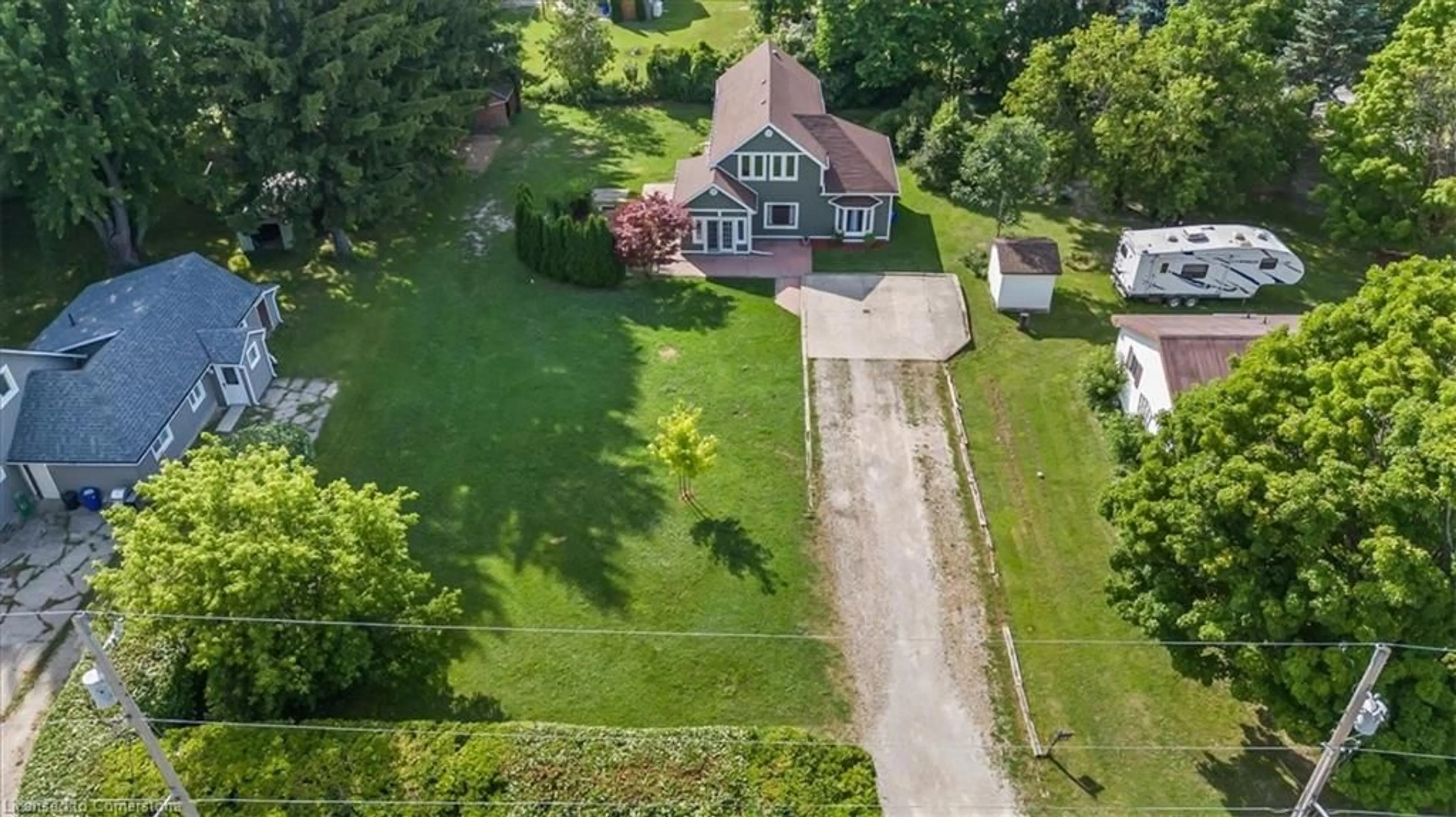 A pic from outside/outdoor area/front of a property/back of a property/a pic from drone, street for 101 King St, Tiverton Ontario N0G 2T0