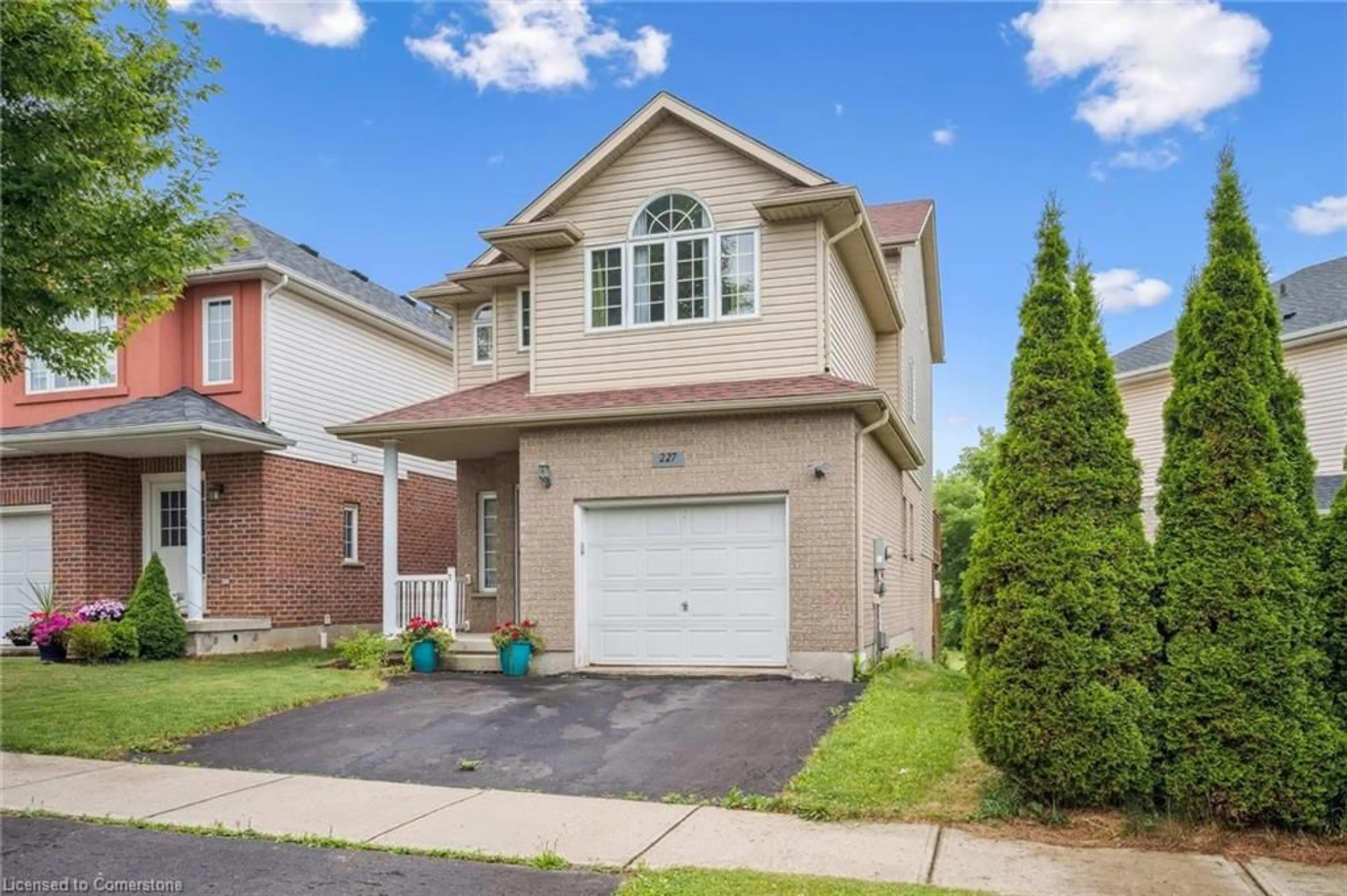 Home with brick exterior material, street for 227 Buttercup Crt, Waterloo Ontario N2V 2W8