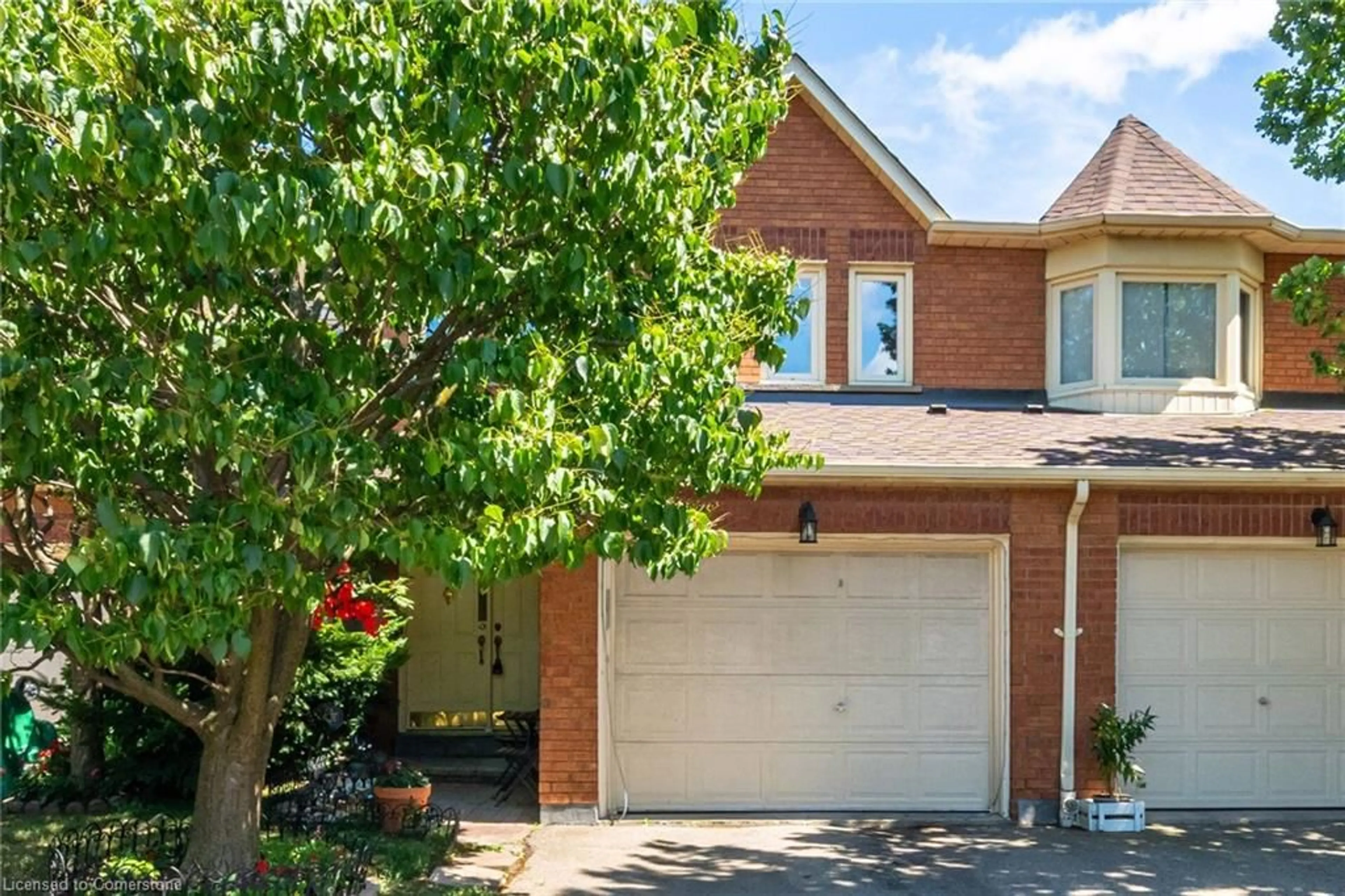 Home with brick exterior material, street for 800 Constellation Dr #23, Mississauga Ontario L5R 3L6
