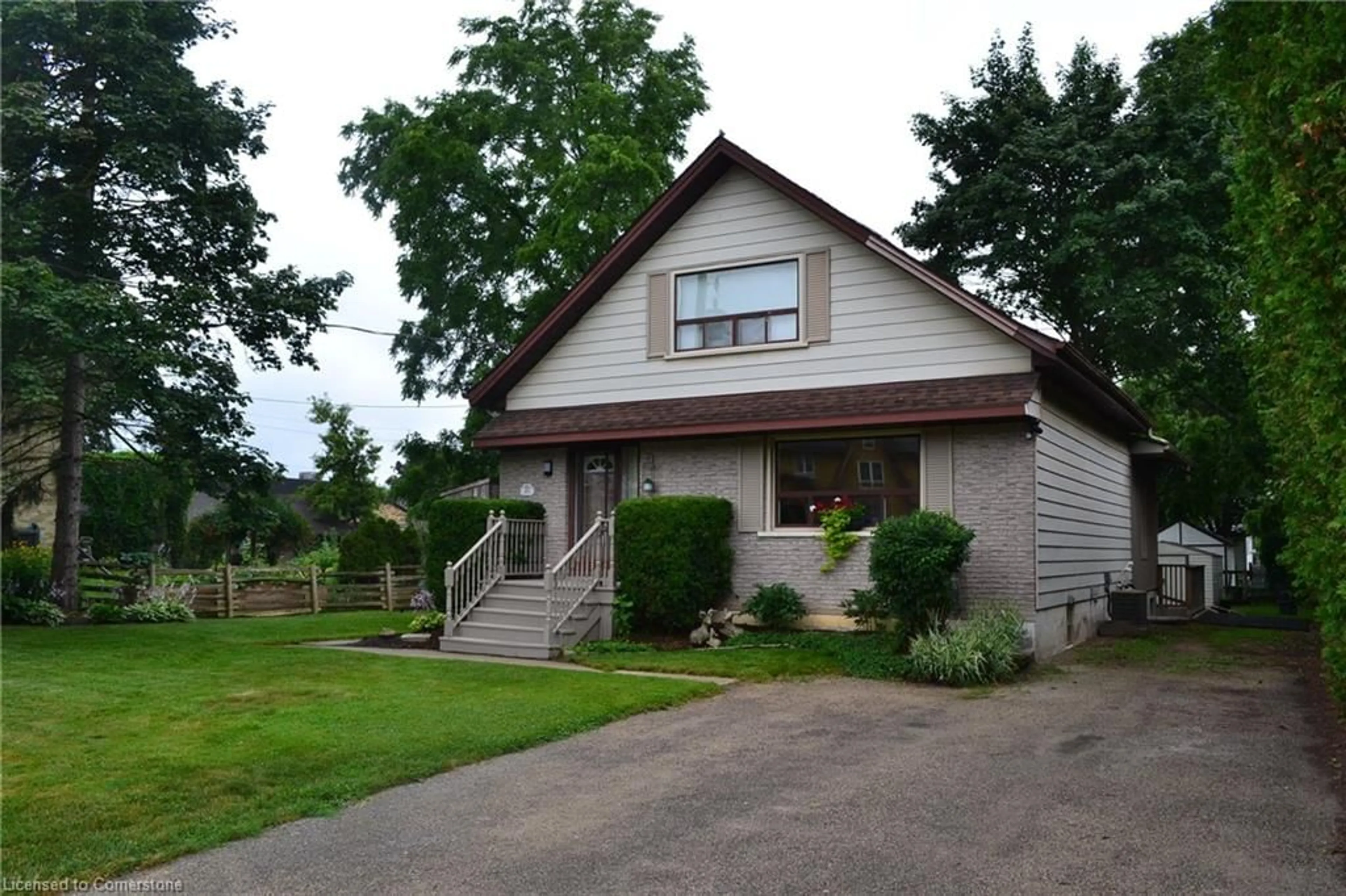 Home with vinyl exterior material, street for 1277 King St, St. Jacobs Ontario N0B 2N0