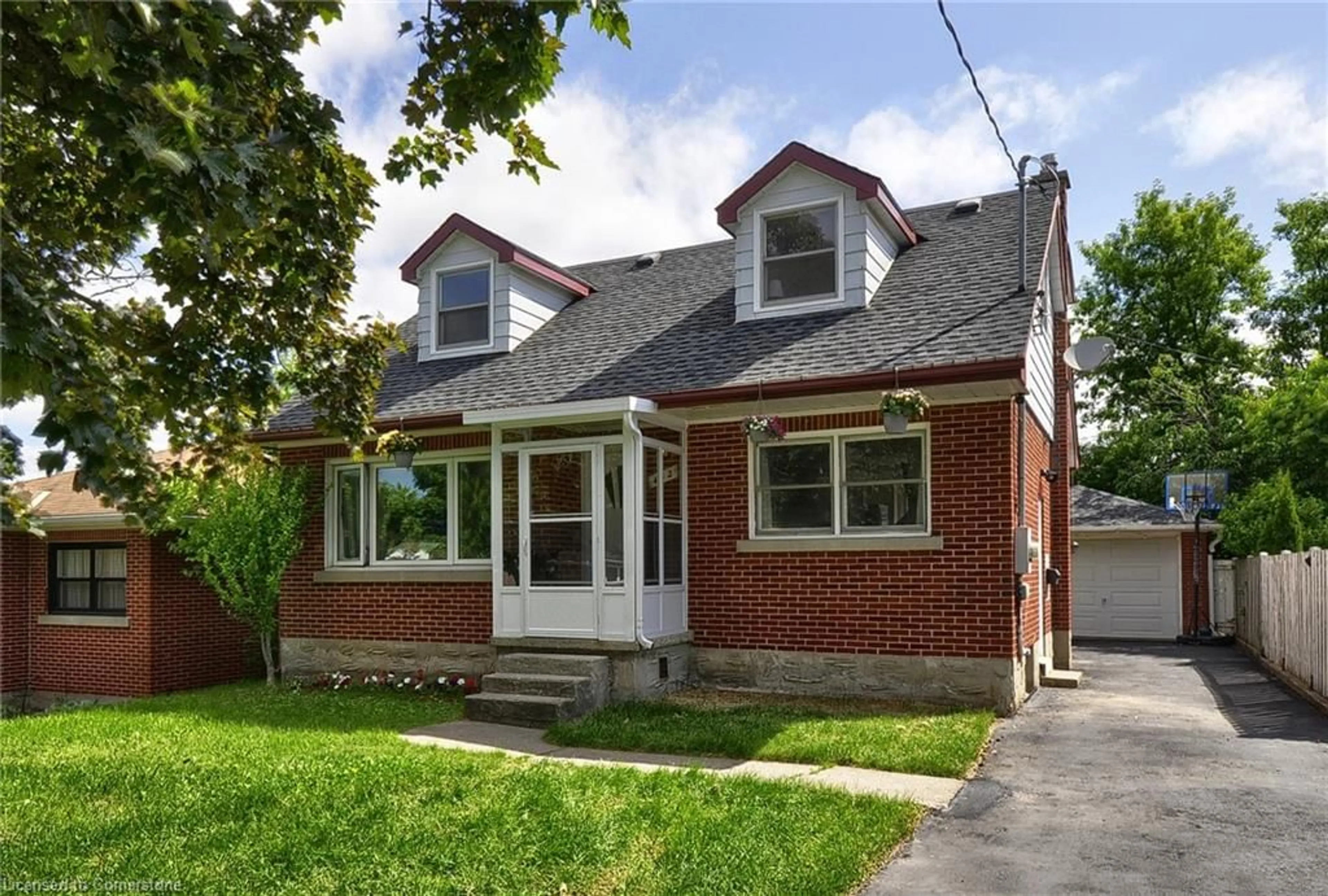 Home with brick exterior material, street for 442 Highland Rd, Kitchener Ontario N2M 3W7