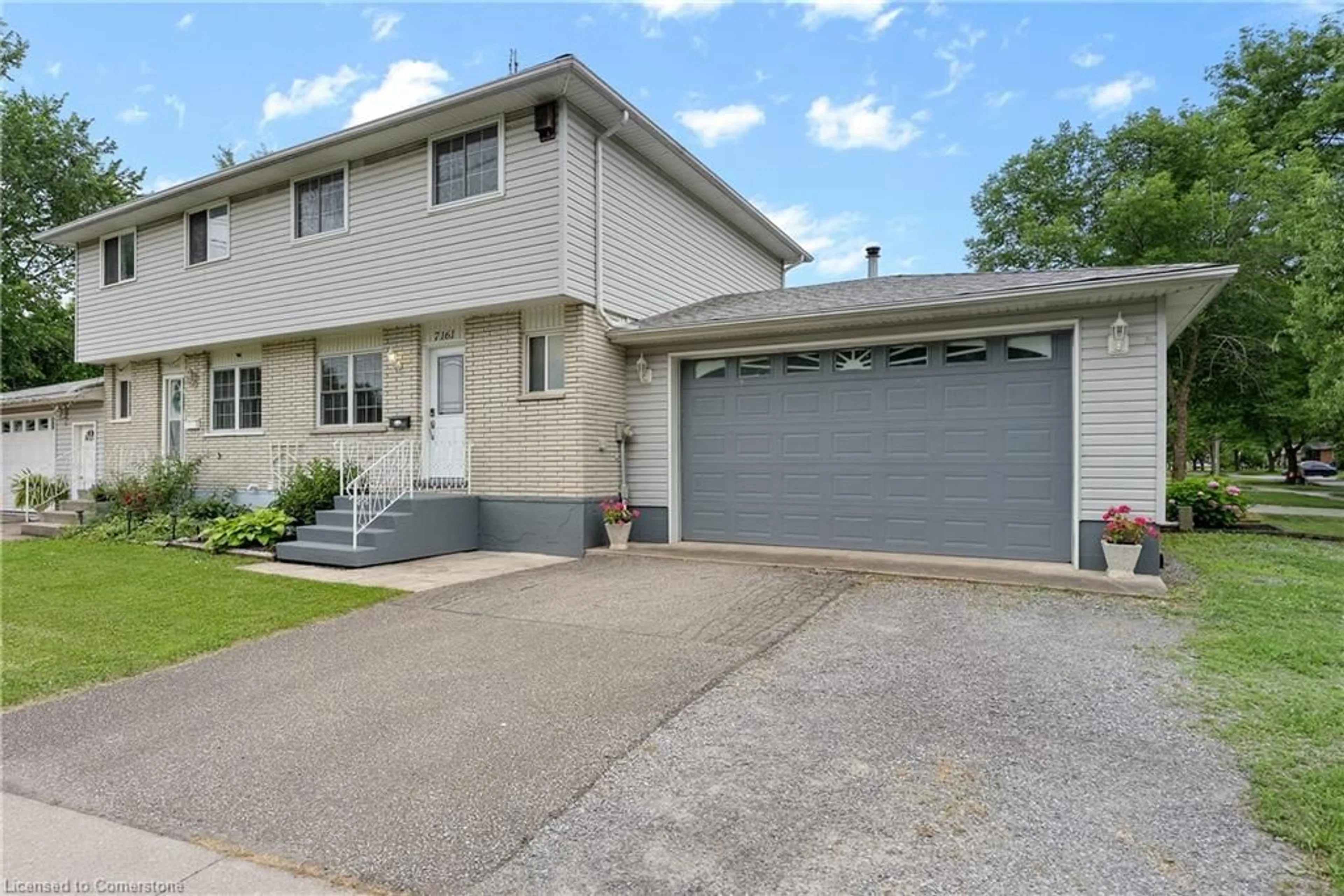 Home with vinyl exterior material, street for 7161 Ailanthus Ave, Niagara Falls Ontario L2G 3W5