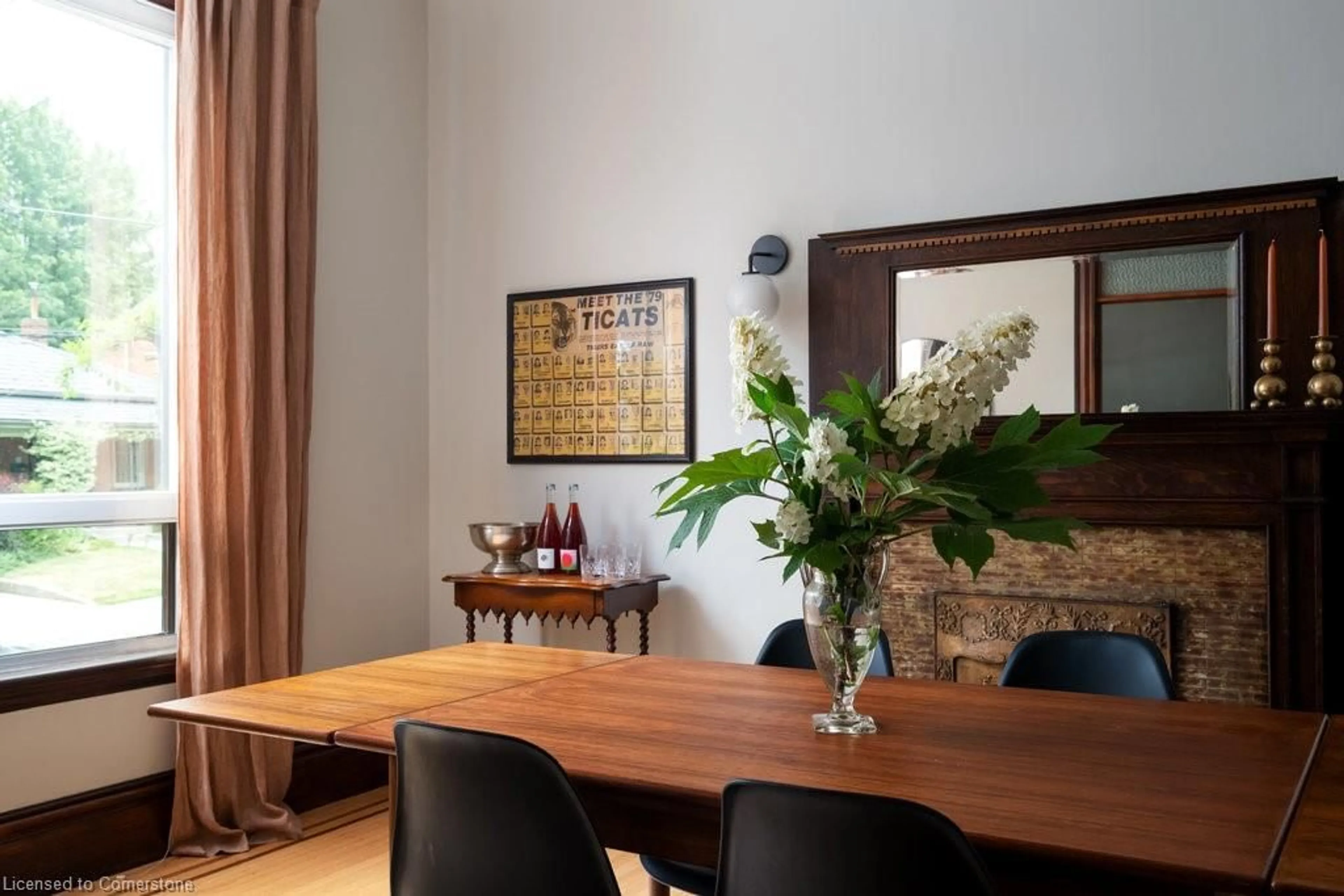 Dining room, wood/laminate floor for 49 Ray St, Hamilton Ontario L8R 2X5