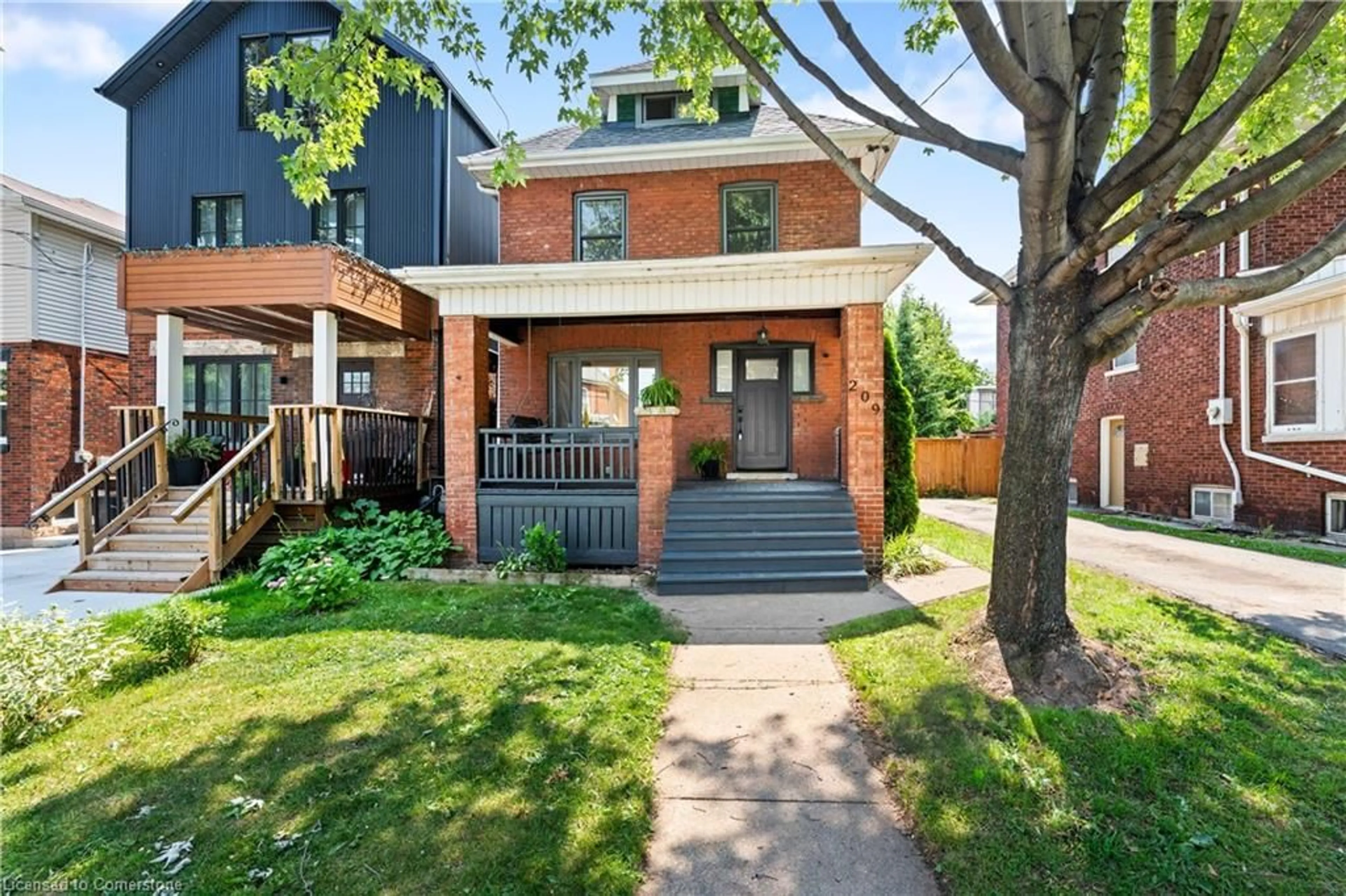 Home with brick exterior material, street for 209 Rothsay Ave, Hamilton Ontario L8M 3G6