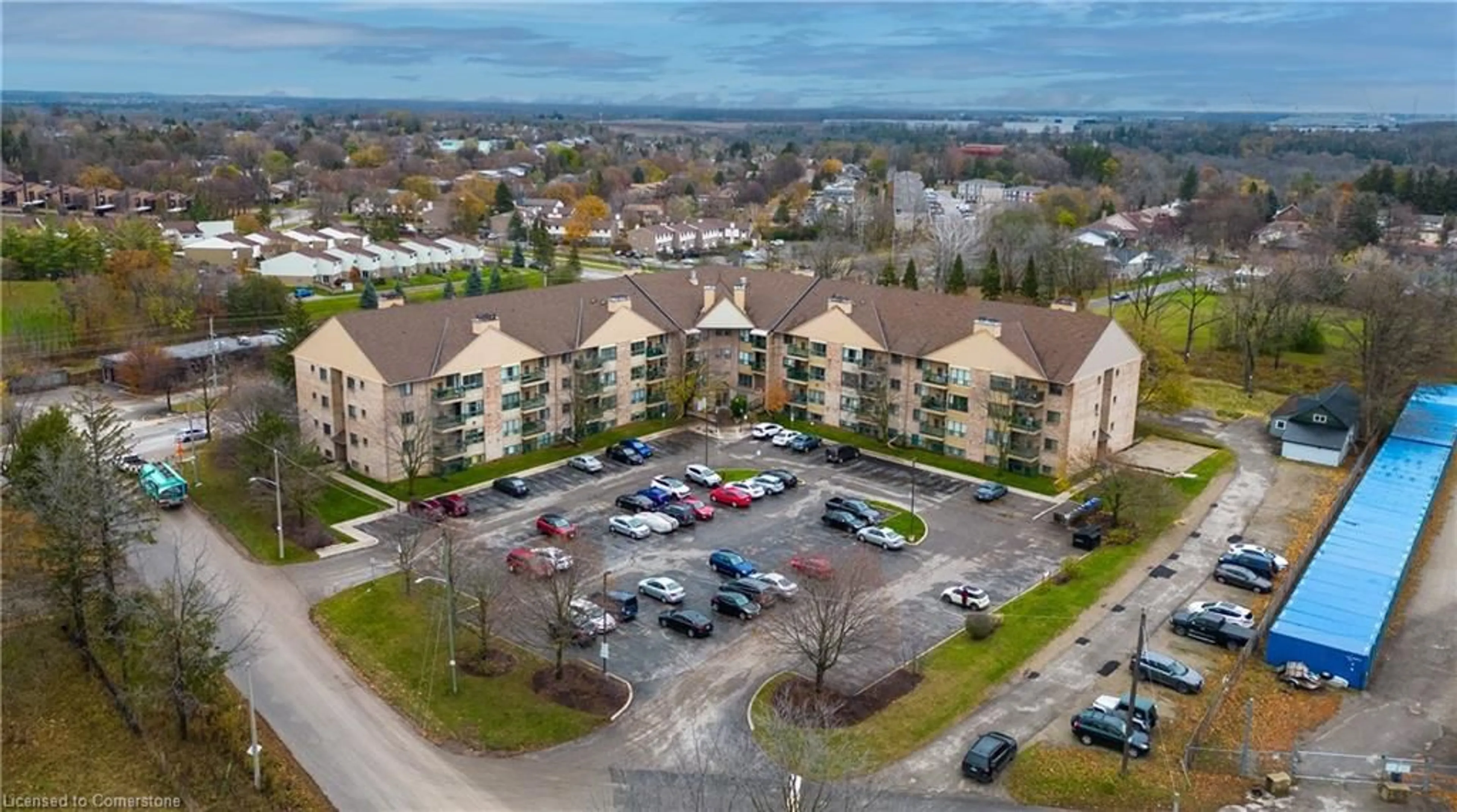 A pic from outside/outdoor area/front of a property/back of a property/a pic from drone, building for 15 Hofstetter Ave #321, Kitchener Ontario N2A 3Z7