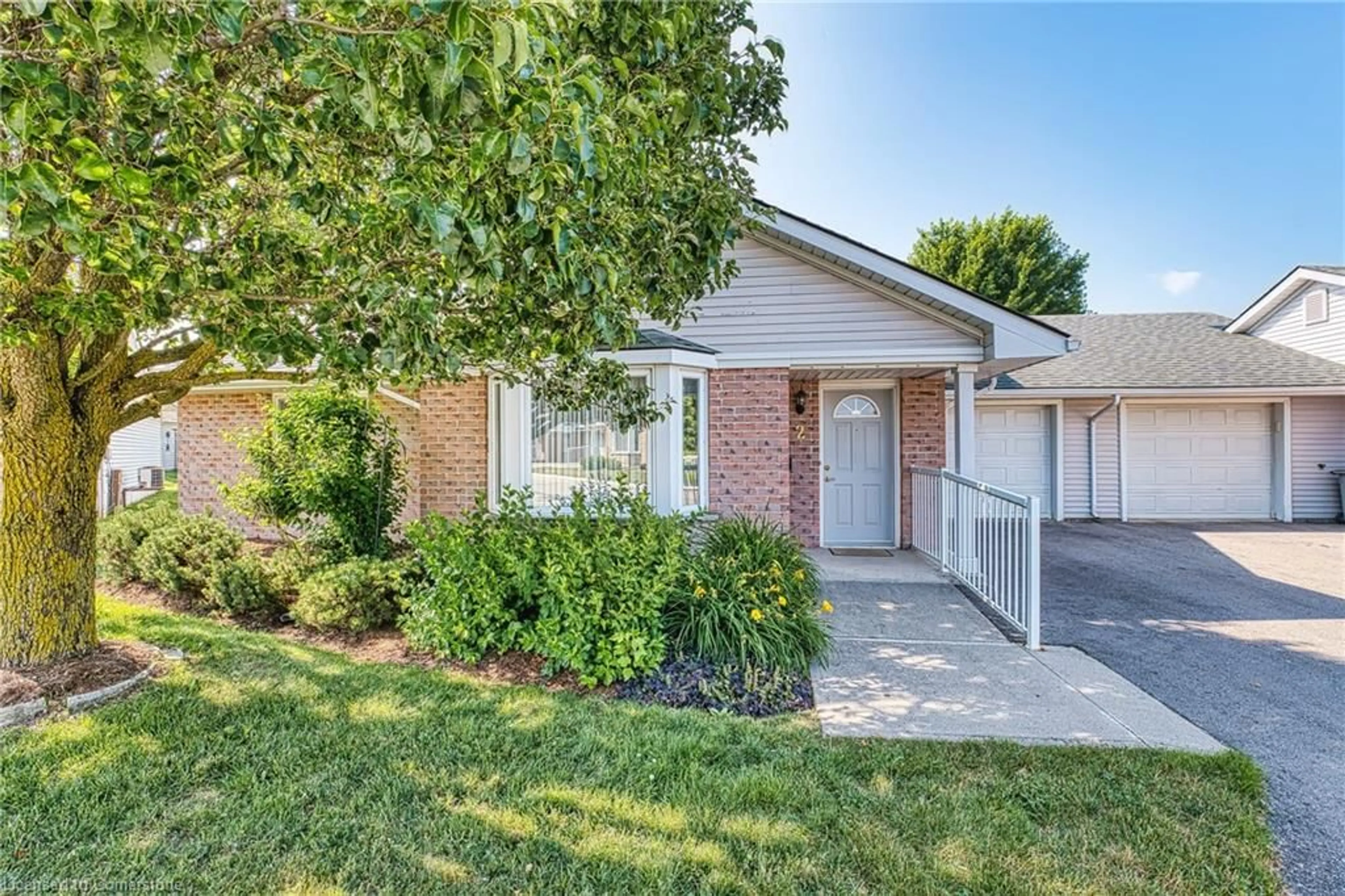 Home with brick exterior material, street for 750 Nelson Ave #2, Listowel Ontario N4W 0C7