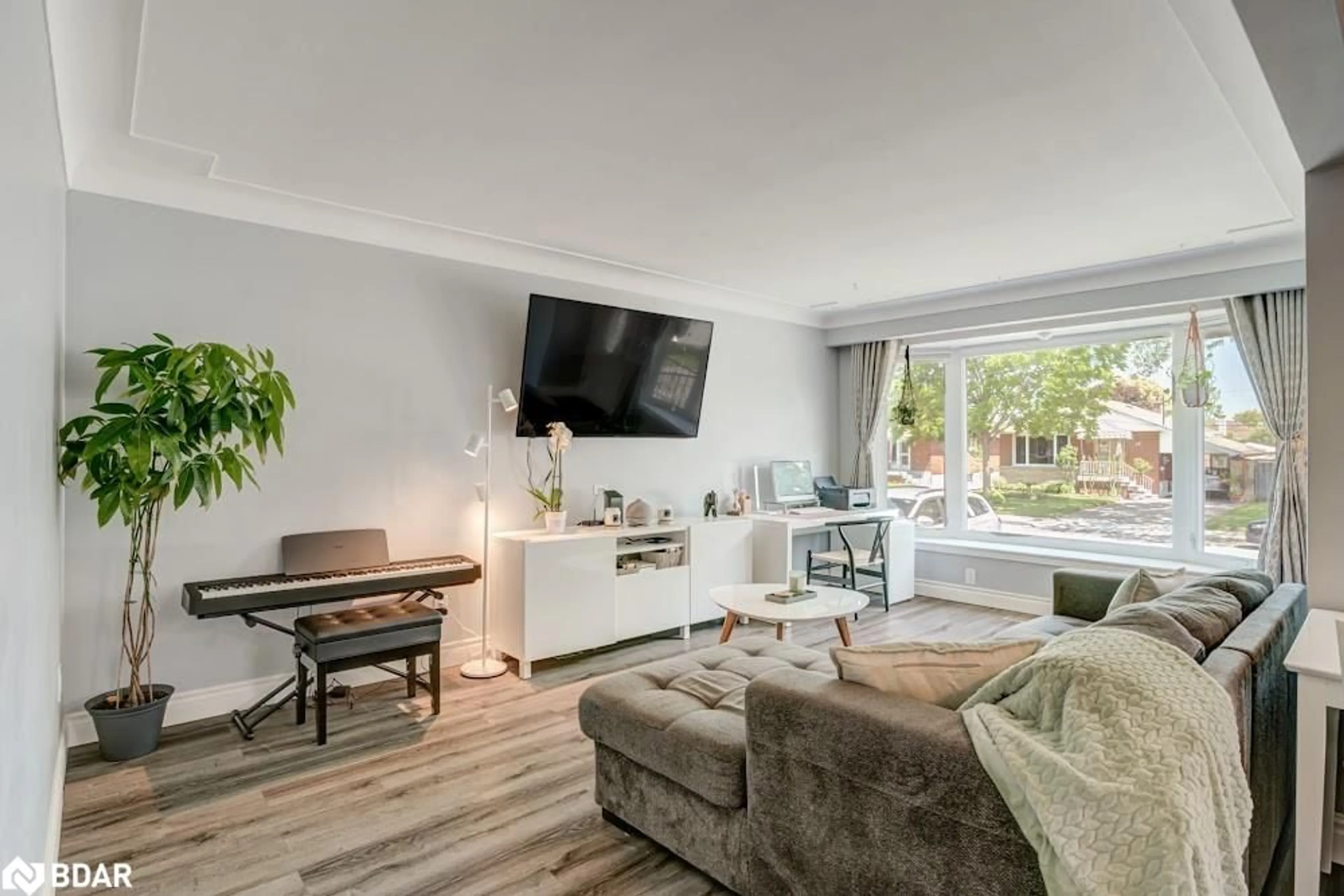 Living room with furniture, wood/laminate floor for 42 Terrace Dr, Hamilton Ontario L9A 2Y6