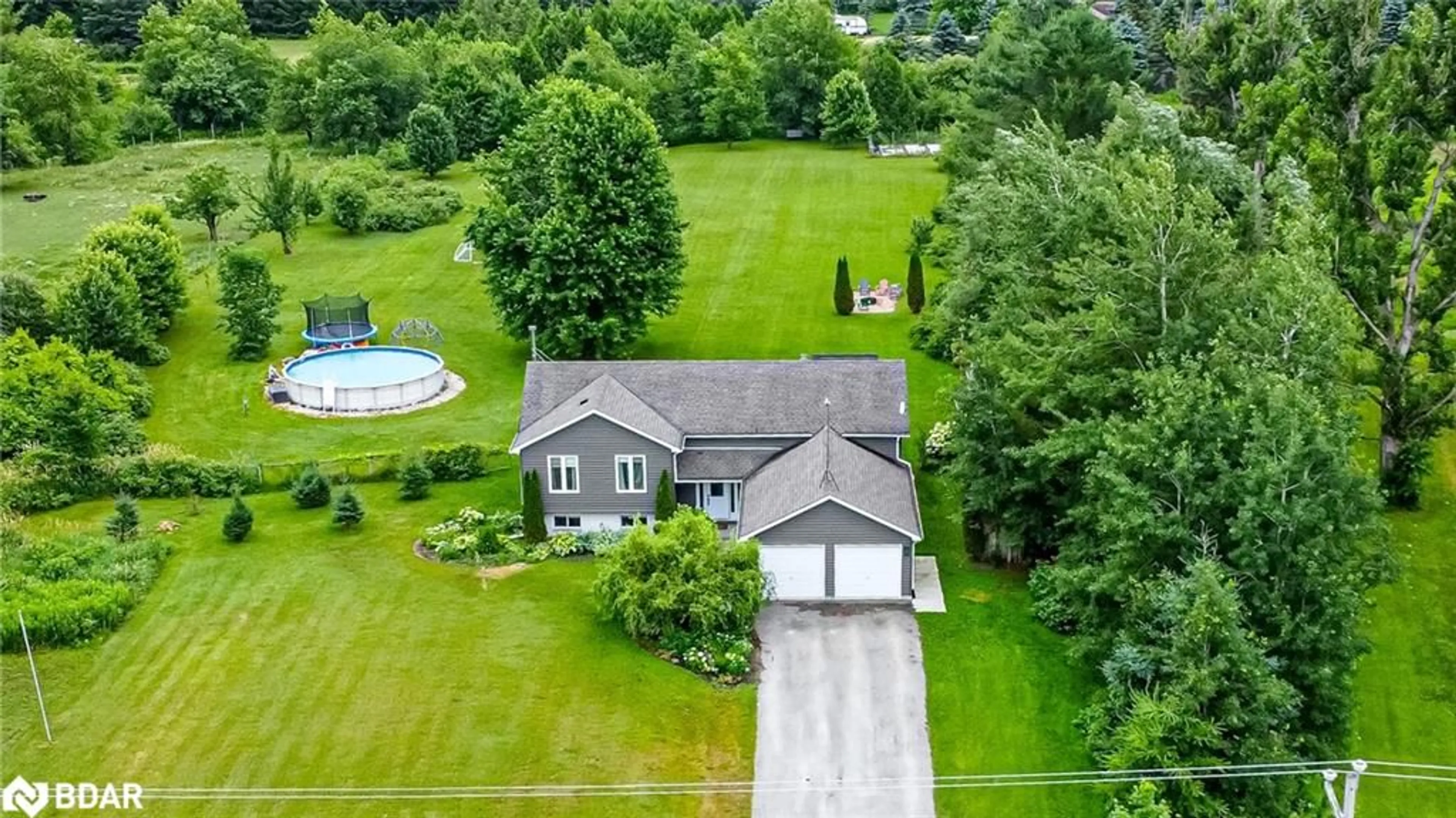 A pic from outside/outdoor area/front of a property/back of a property/a pic from drone, water/lake/river/ocean view for 285 Warminster Sideroad, Oro-Medonte Ontario L0K 1E0