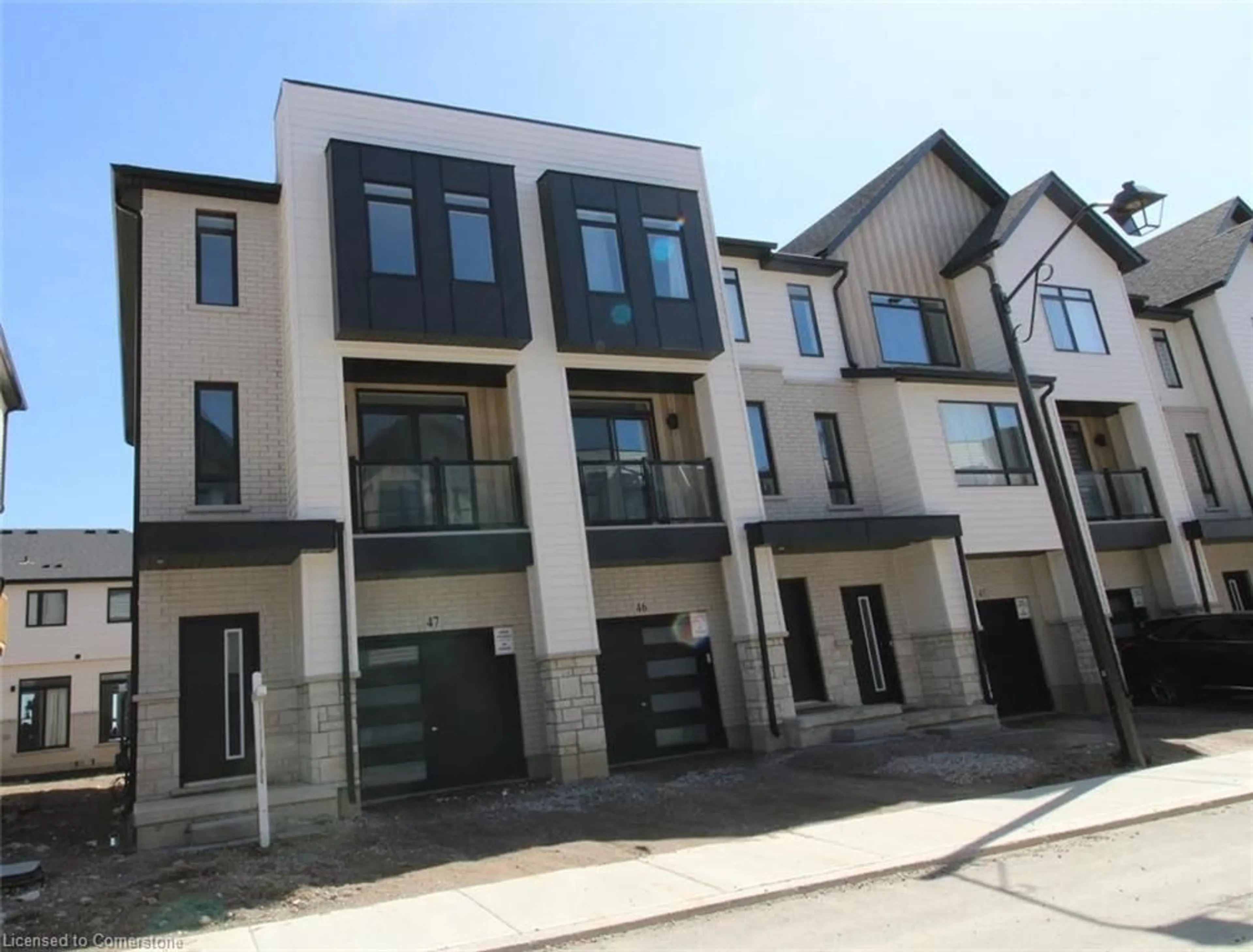 A pic from outside/outdoor area/front of a property/back of a property/a pic from drone, street for 55 Tom Brown Dr #47, Paris Ontario N3L 0N5
