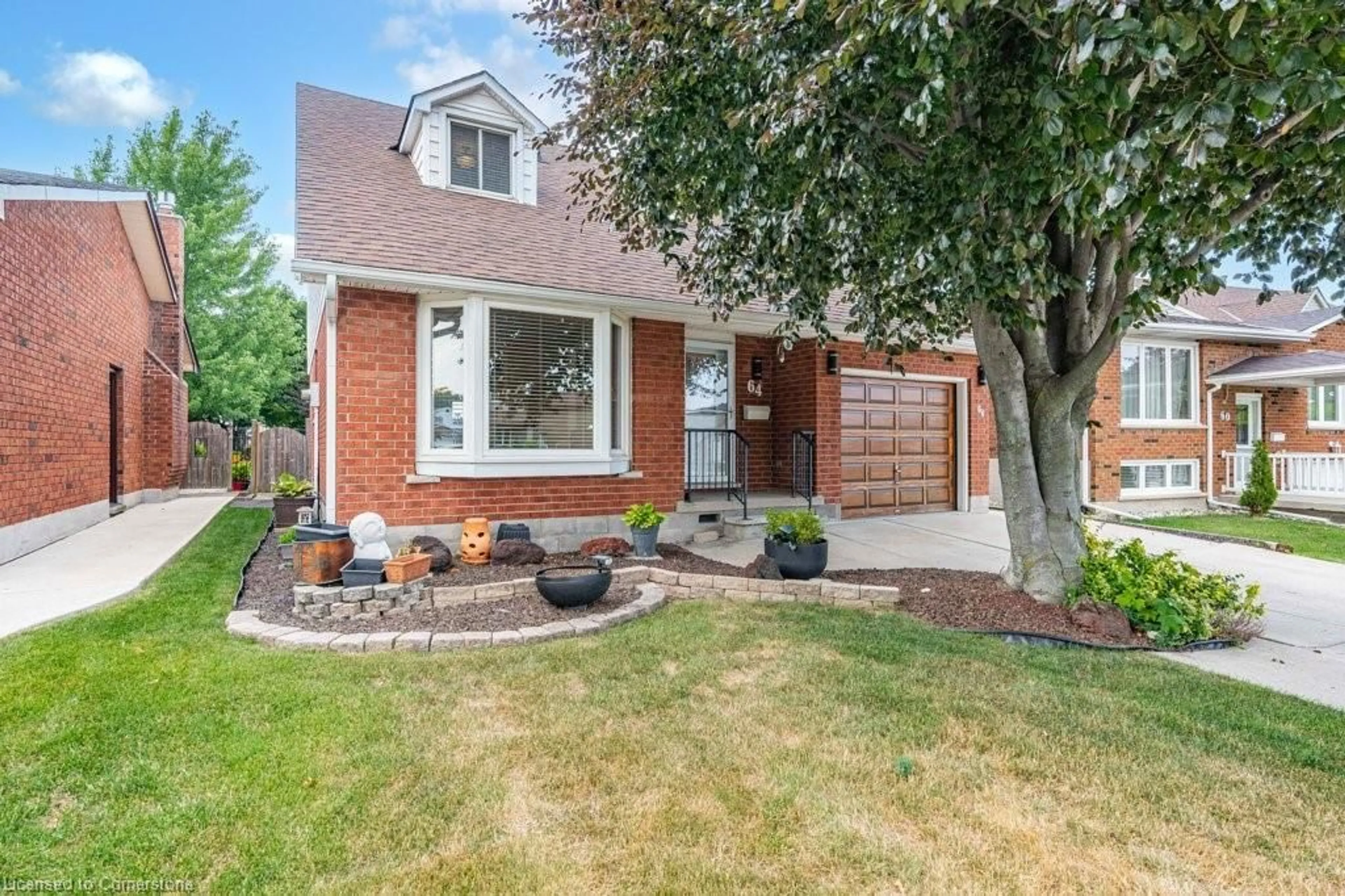 Home with brick exterior material, street for 64 Abbot Dr, Hamilton Ontario L8V 4W5