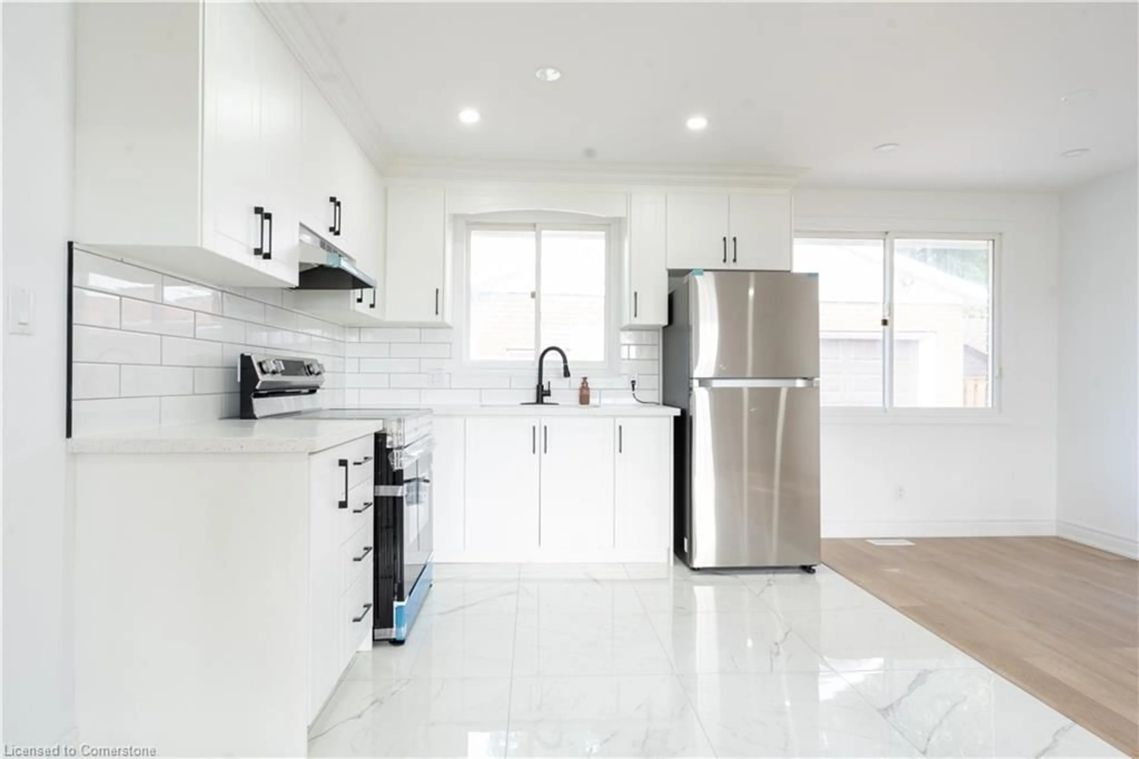 Open concept kitchen, ceramic/tile floor for 7010 Whitman Ave, Niagara Falls Ontario L2G 5B6