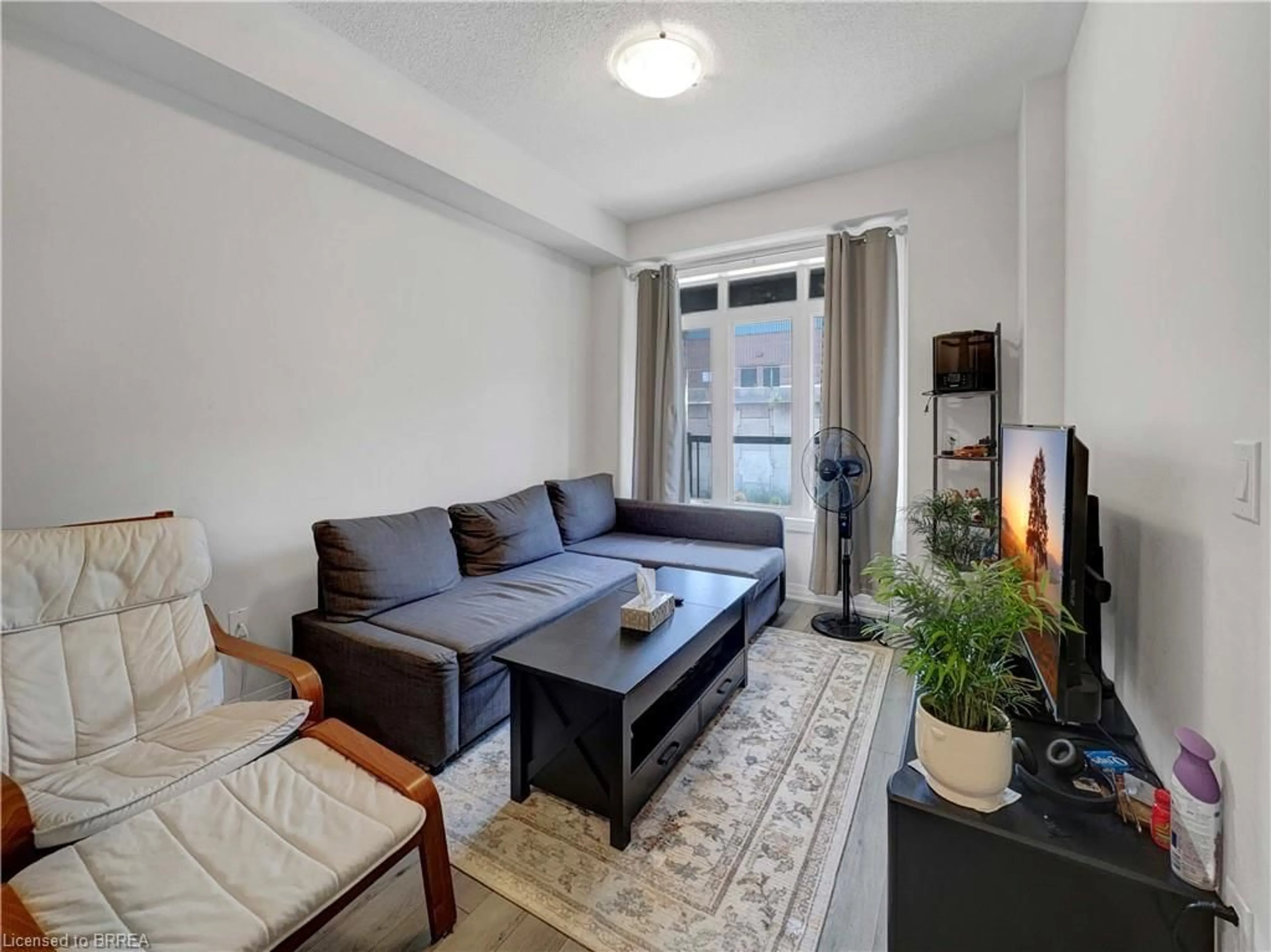 Living room with furniture, unknown for 585 Colborne St #1105, Brantford Ontario N3S 0K4