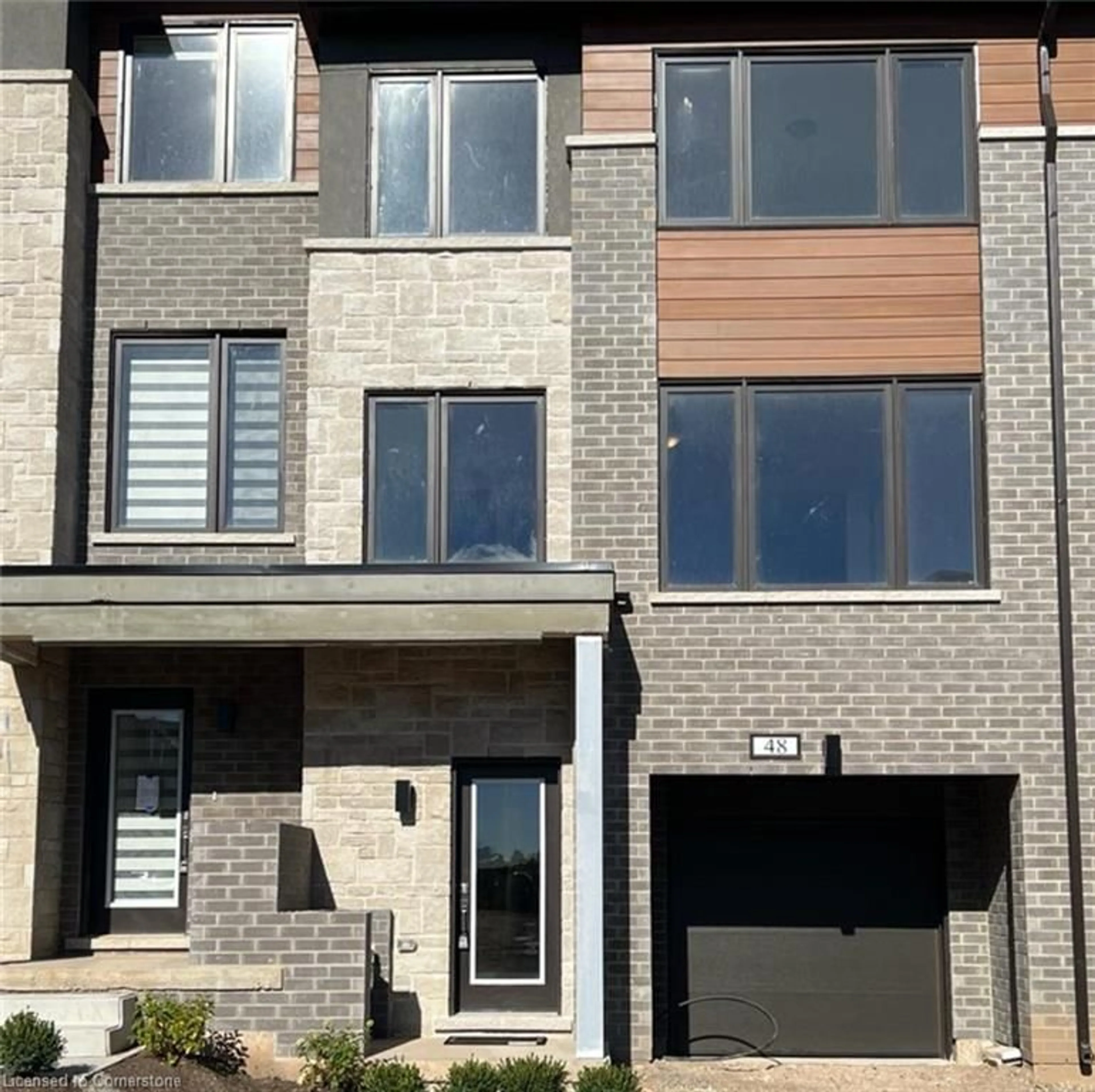 Home with brick exterior material, street for 48 Windtree Way, Georgetown Ontario L7G 0P6