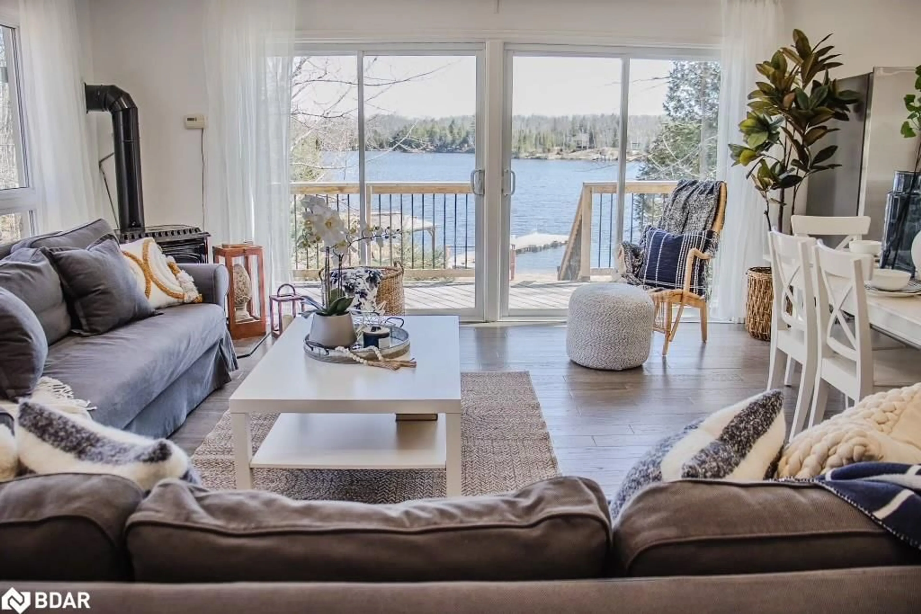 Living room with furniture, wood/laminate floor for 18 Bay View Lane, Gilmour Ontario K0L 1W0