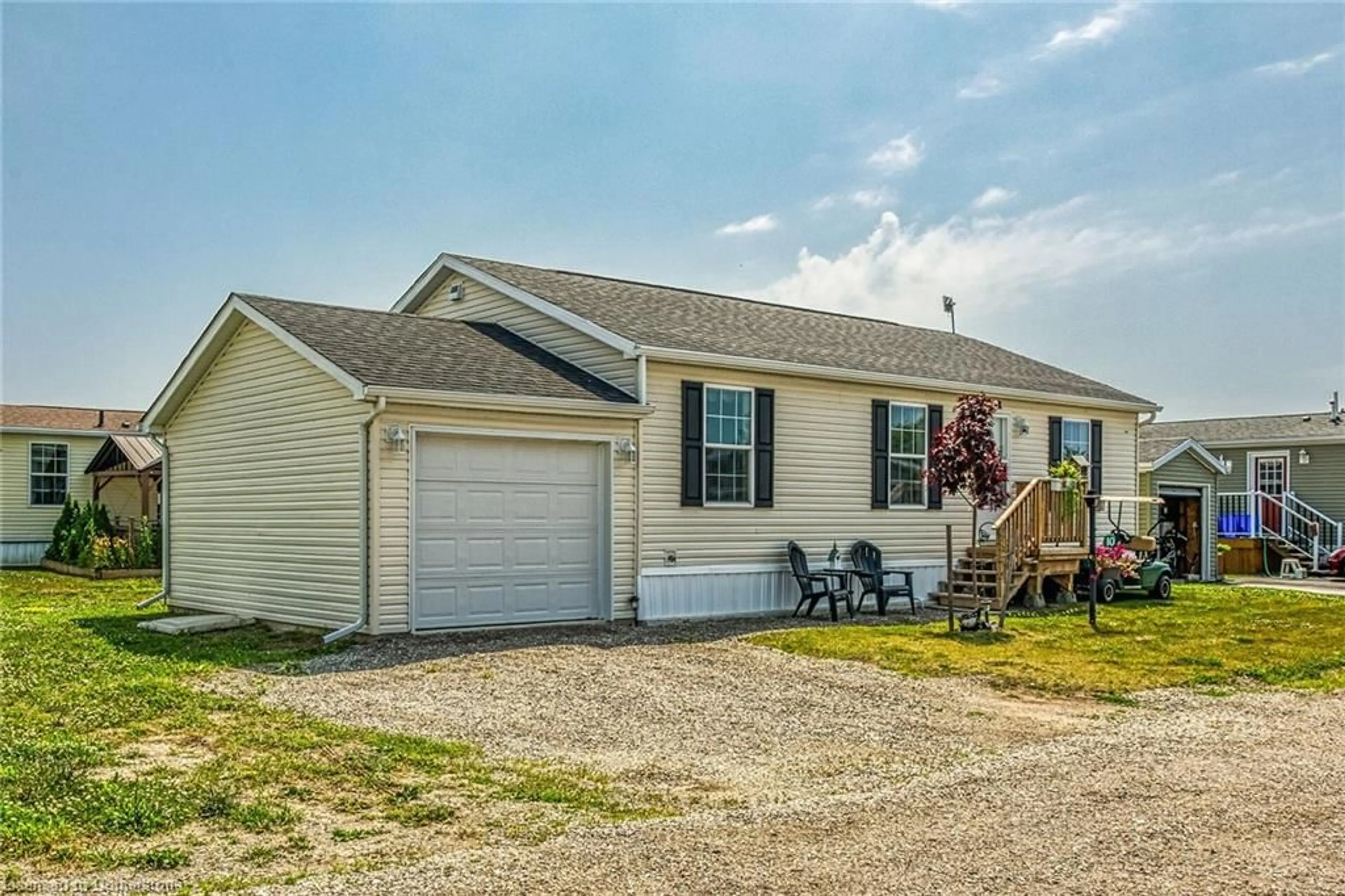 Home with vinyl exterior material, street for 10 Marsh Cove, Nanticoke Ontario N0A 1L0