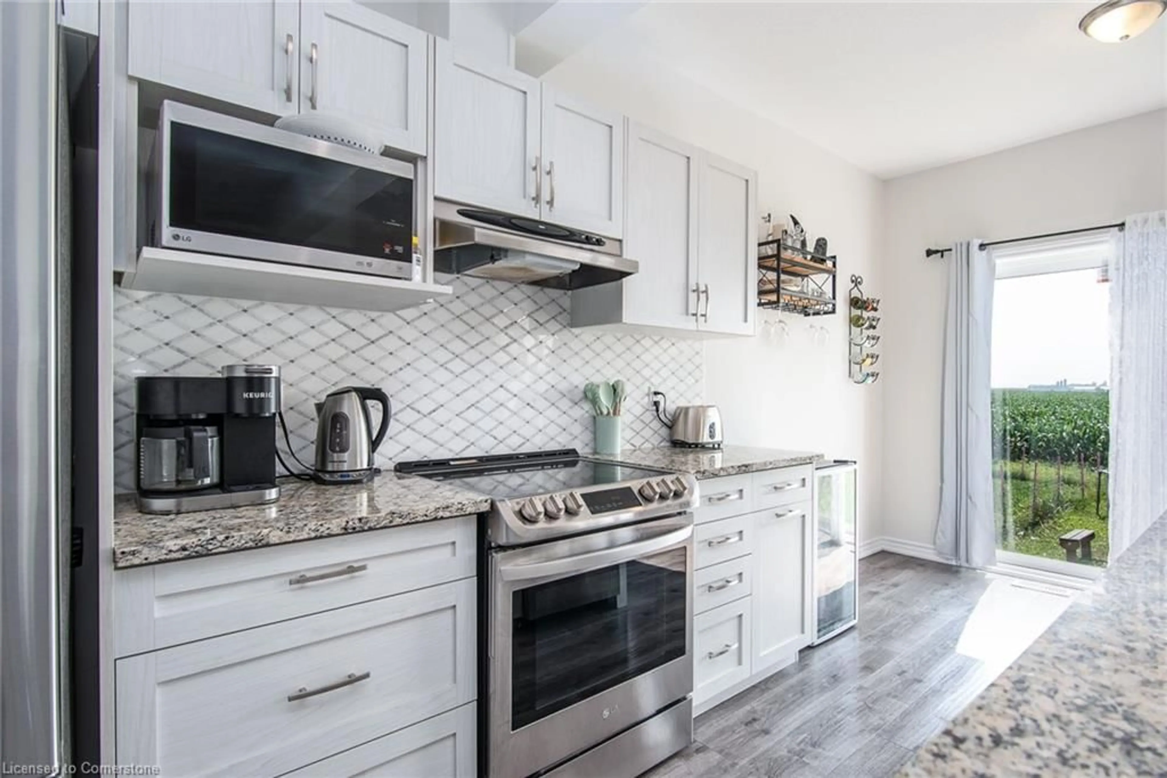 Open concept kitchen, ceramic/tile floor for 106 Maple St, Drayton Ontario N0G 1P0
