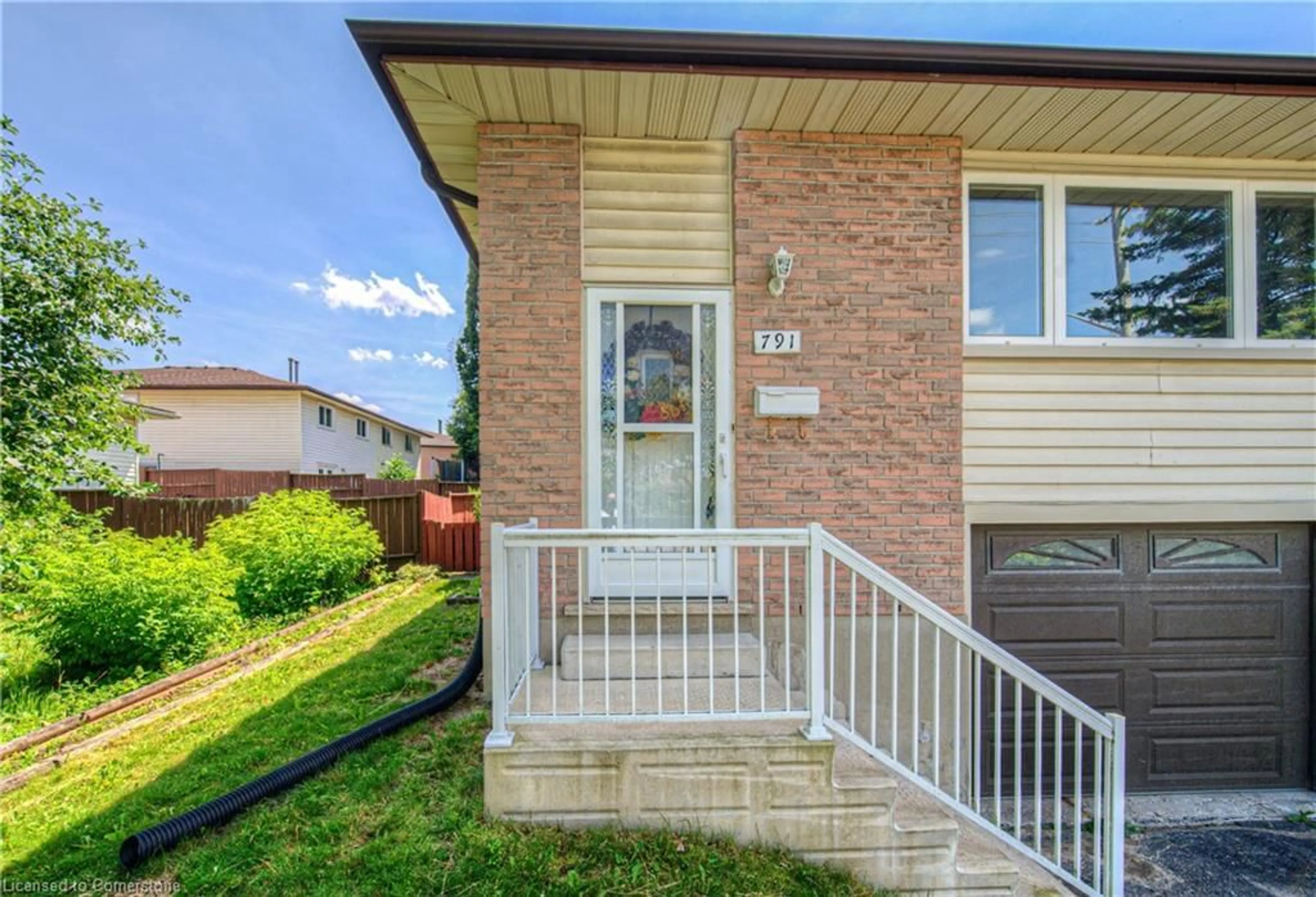 Home with brick exterior material, street for 791 Doon Village Rd, Kitchener Ontario N2P 1A1