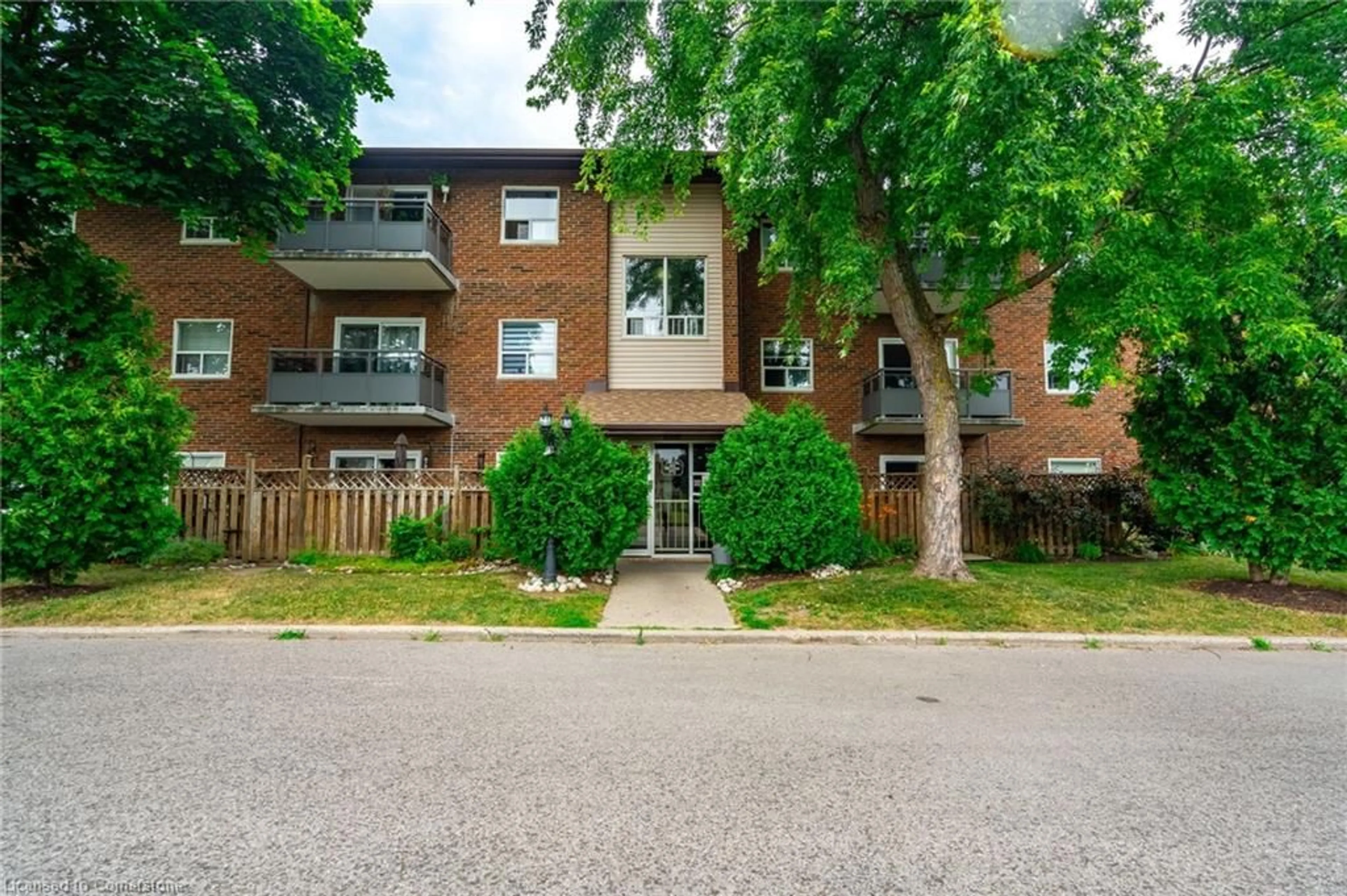Home with brick exterior material, street for 608 Grey St #11, Brantford Ontario N3S 4Y1