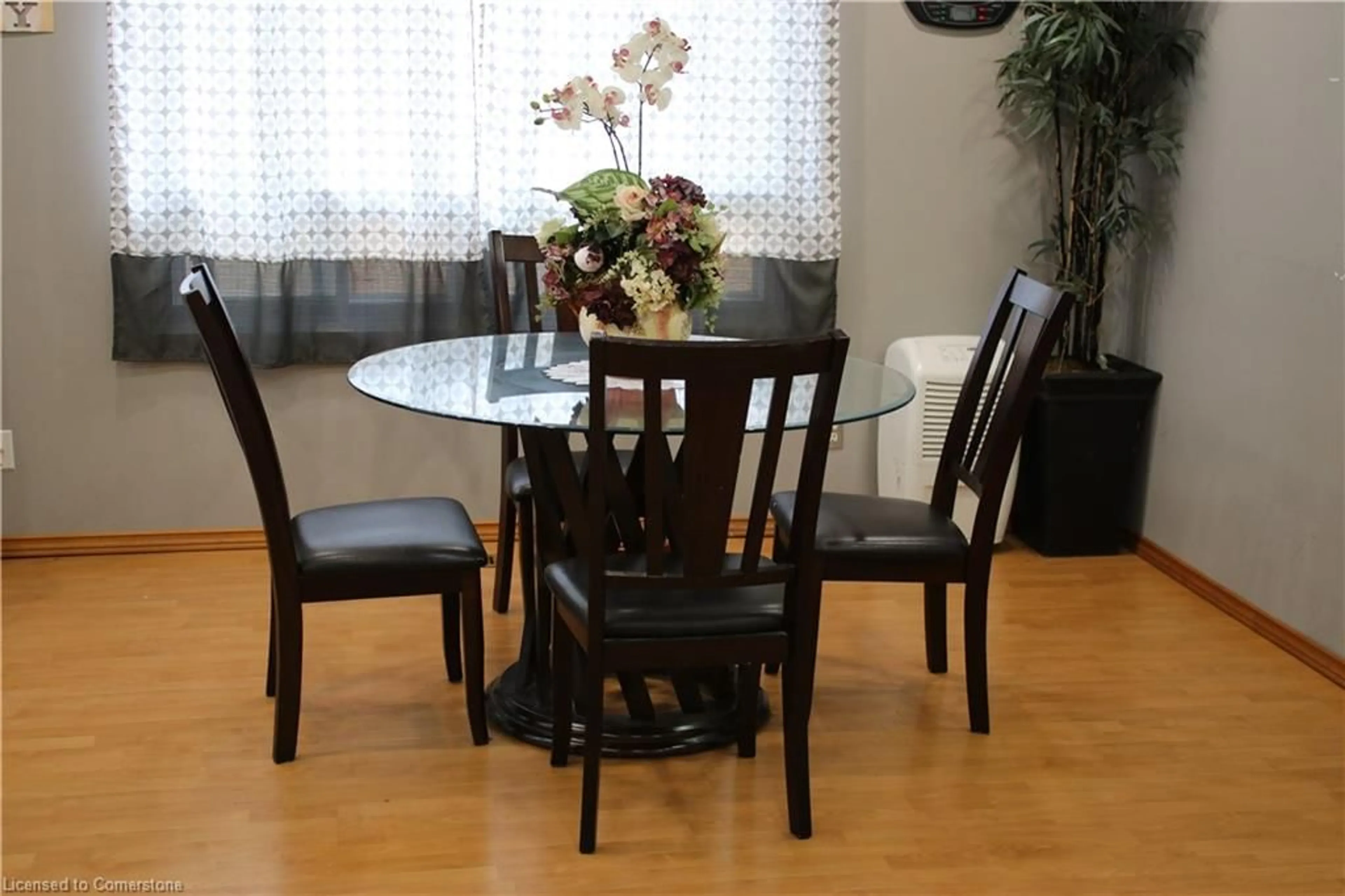 Dining room, wood/laminate floor for 665 Lakeshore Rd, Sarnia Ontario N7V 2T1