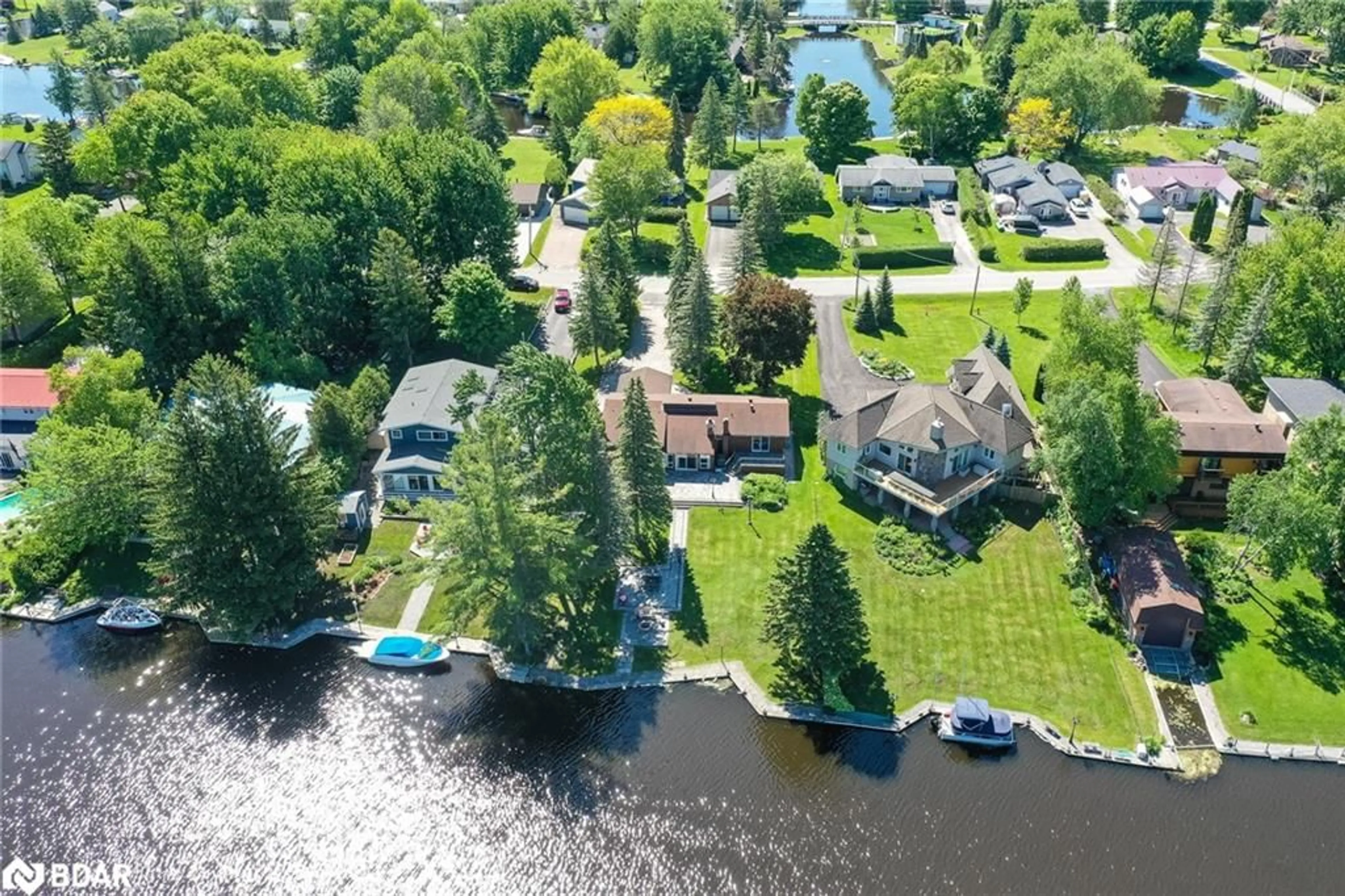 A pic from outside/outdoor area/front of a property/back of a property/a pic from drone, water/lake/river/ocean view for 35 Old Indian Trail, Brechin Ontario L0K 1B0