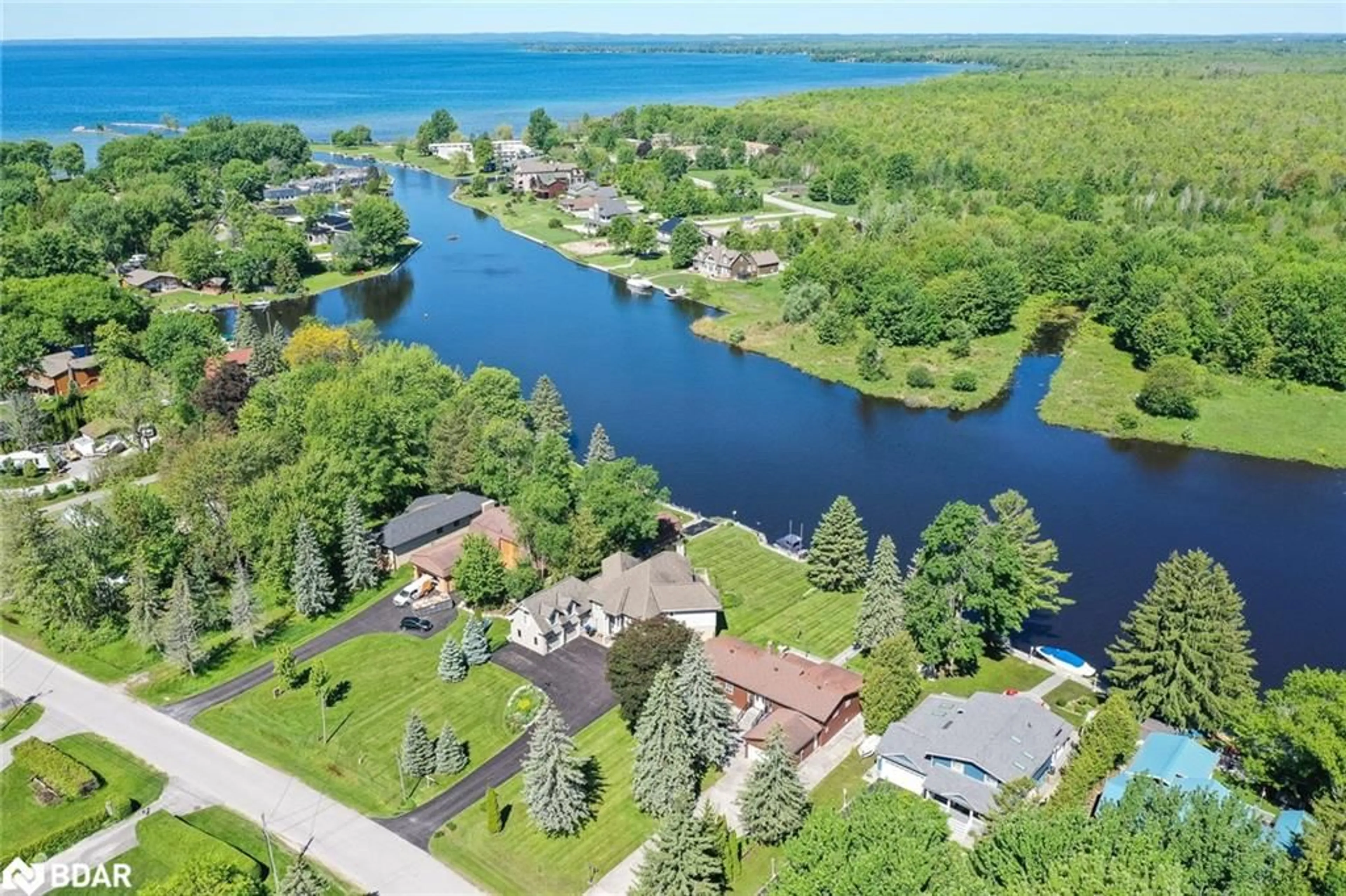 A pic from outside/outdoor area/front of a property/back of a property/a pic from drone, water/lake/river/ocean view for 35 Old Indian Trail, Brechin Ontario L0K 1B0