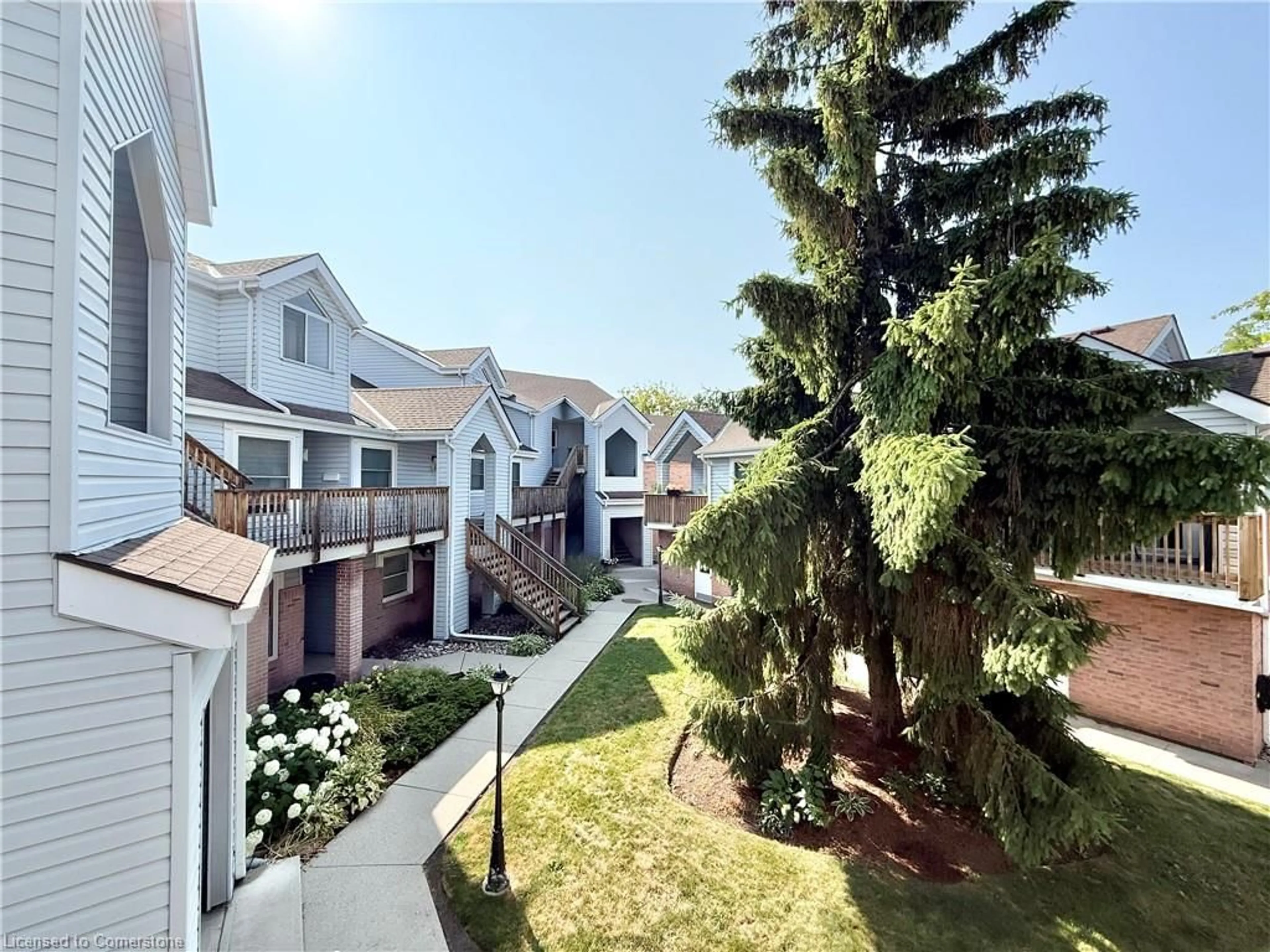 A pic from outside/outdoor area/front of a property/back of a property/a pic from drone, unknown for 1220 Thorpe Rd #214, Burlington Ontario L7S 2H5