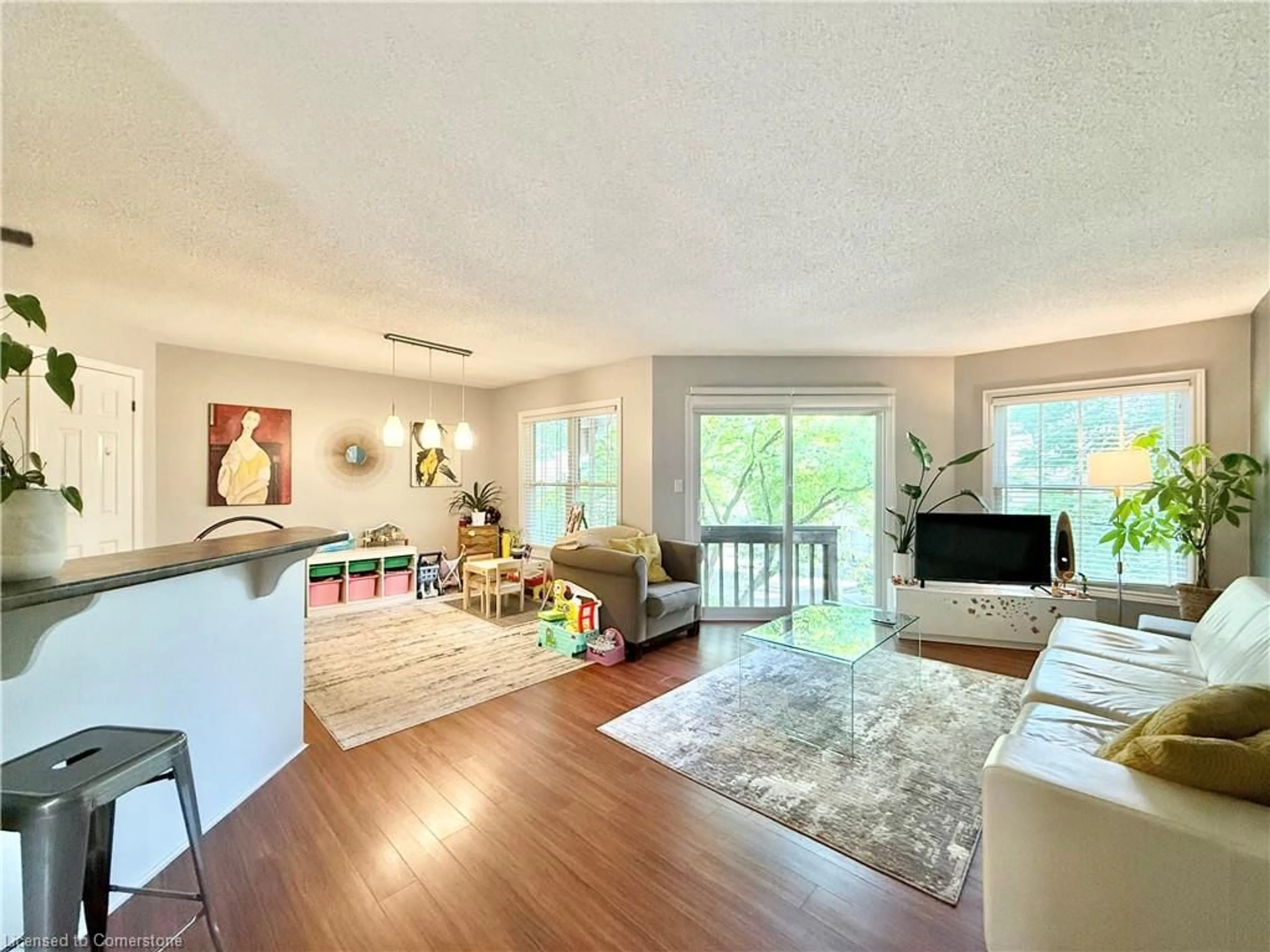 Living room with furniture, unknown for 1220 Thorpe Rd #214, Burlington Ontario L7S 2H5