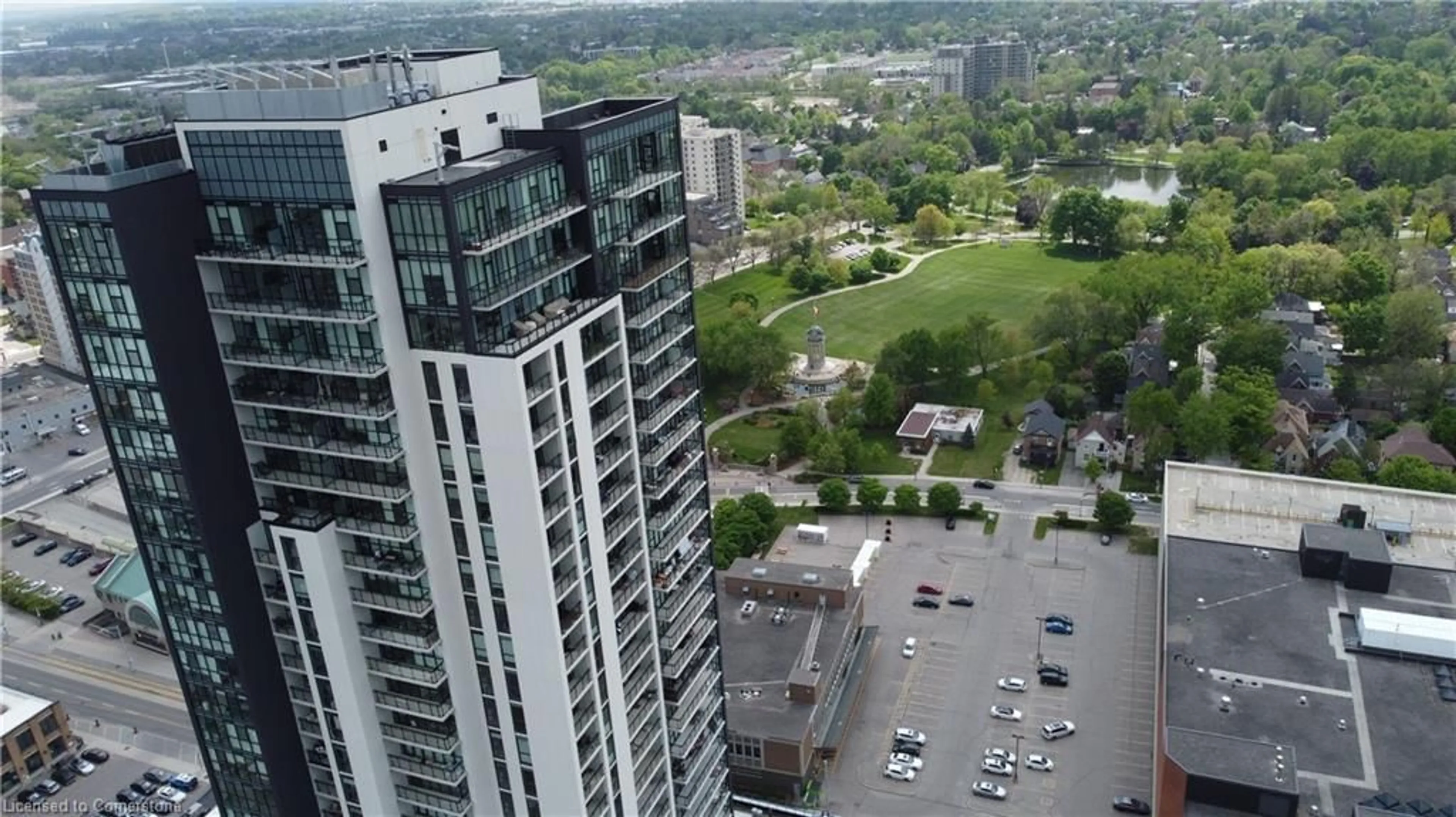 A pic from outside/outdoor area/front of a property/back of a property/a pic from drone, city buildings view from balcony for 60 Charles St #1601, Kitchener Ontario N2G 0C9